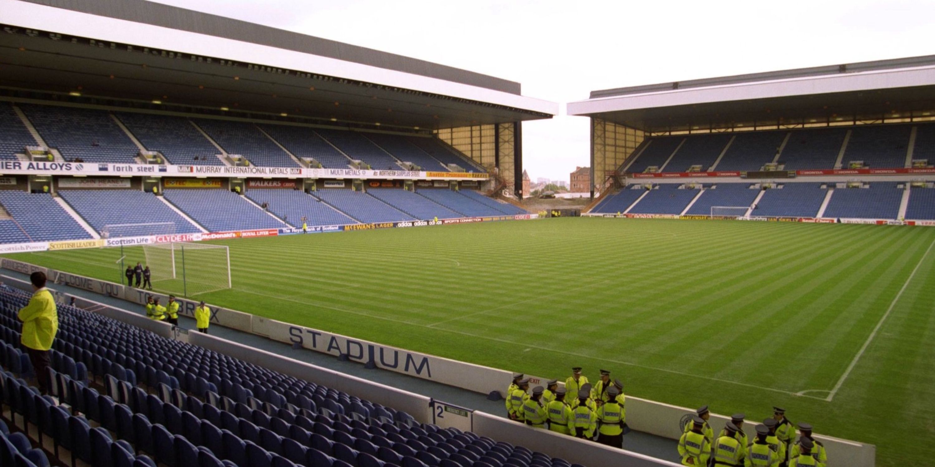 A wide shot of the interior of Ibrox Stadium. 