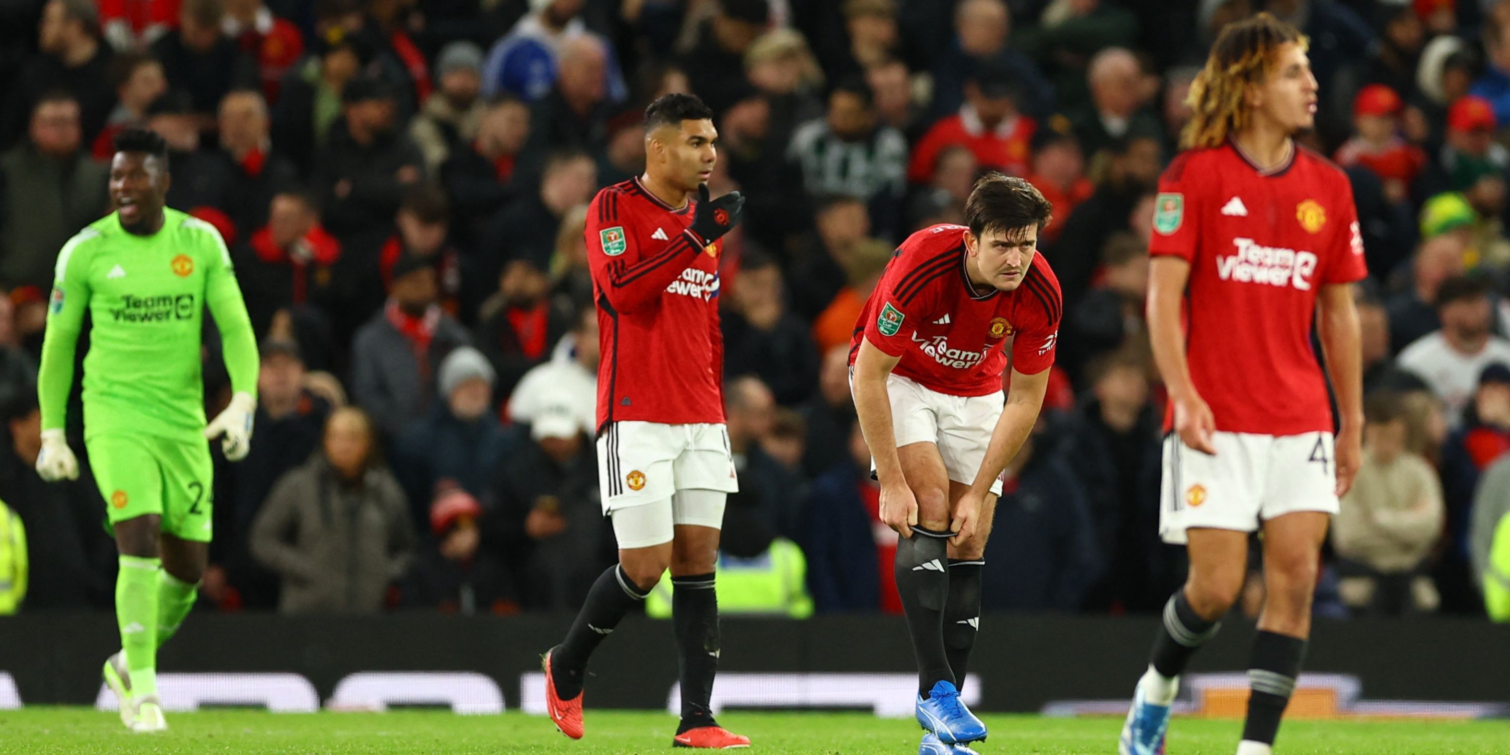 Manchester United's Harry Maguire, Casemiro and teammates look dejected