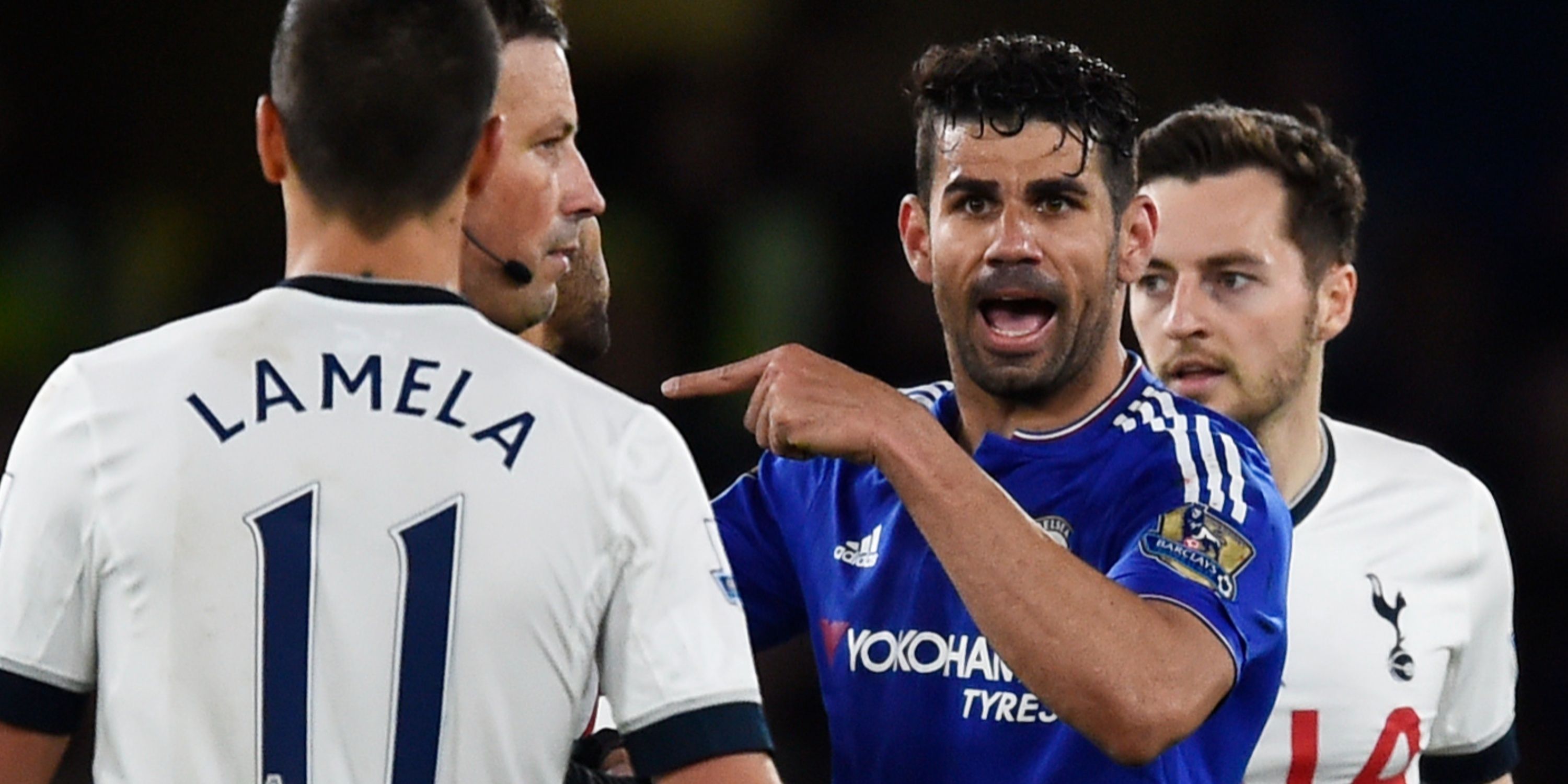 Chelsea's Diego Costa gestures towards Tottenham's Erik Lamela as referee Mark Clattenburg looks on