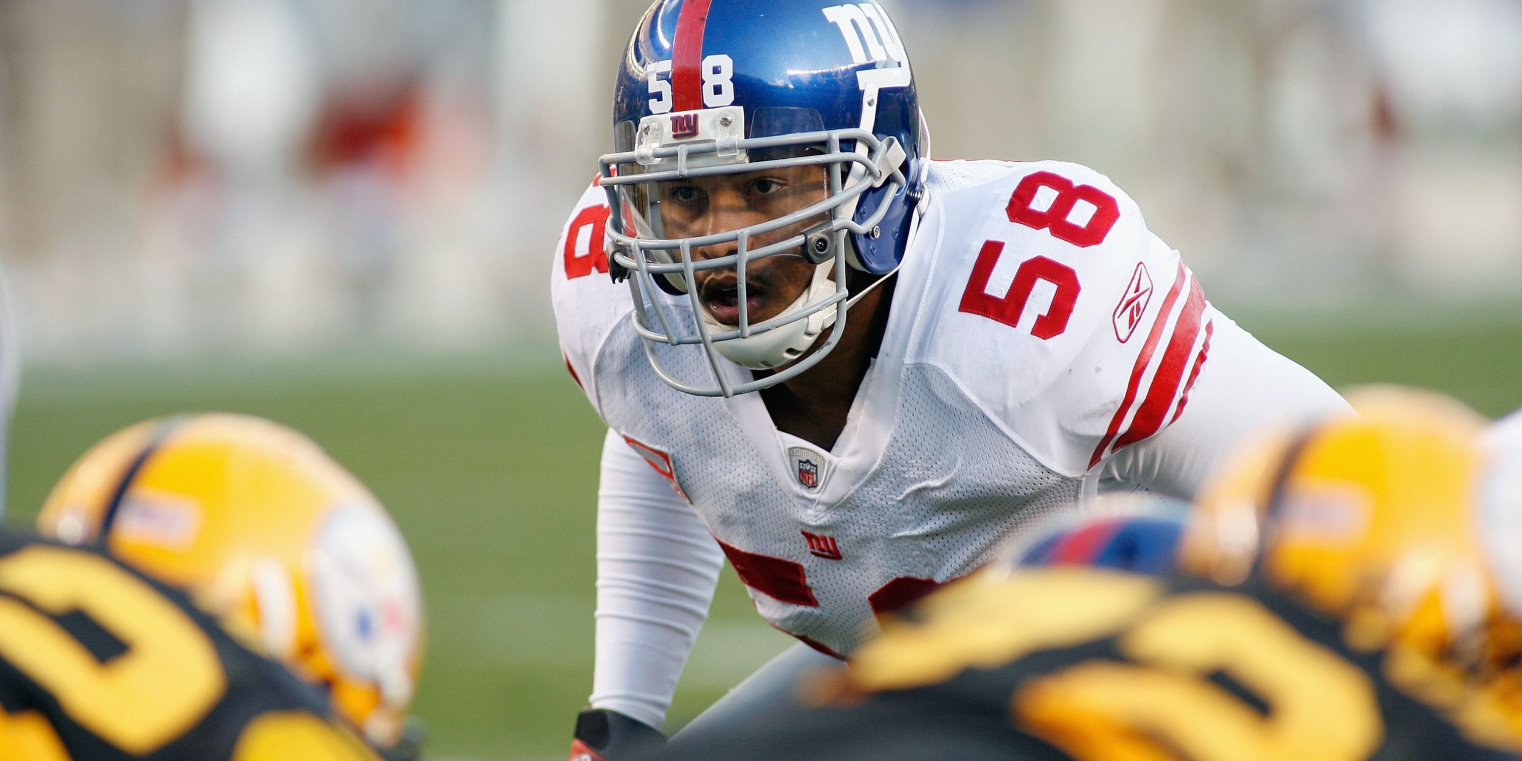Who is Raiders interim head coach Antonio Pierce?