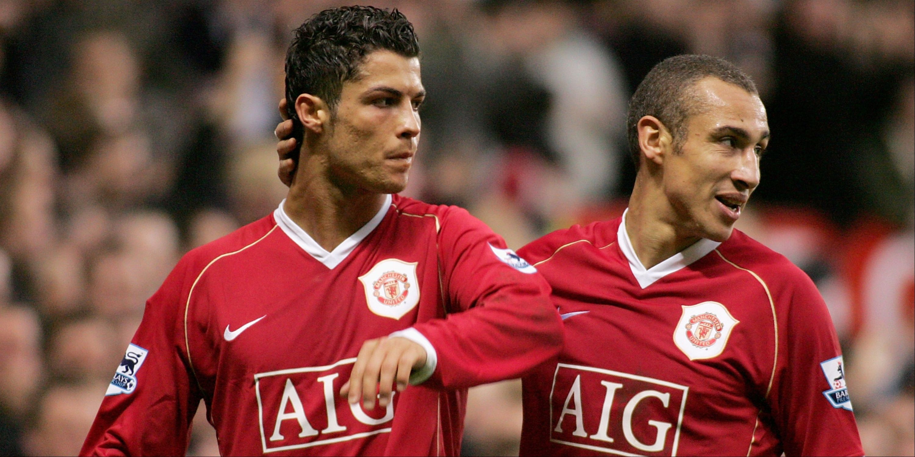 Cristiano Ronaldo of Manchester United celebrates with Henrik Larsson