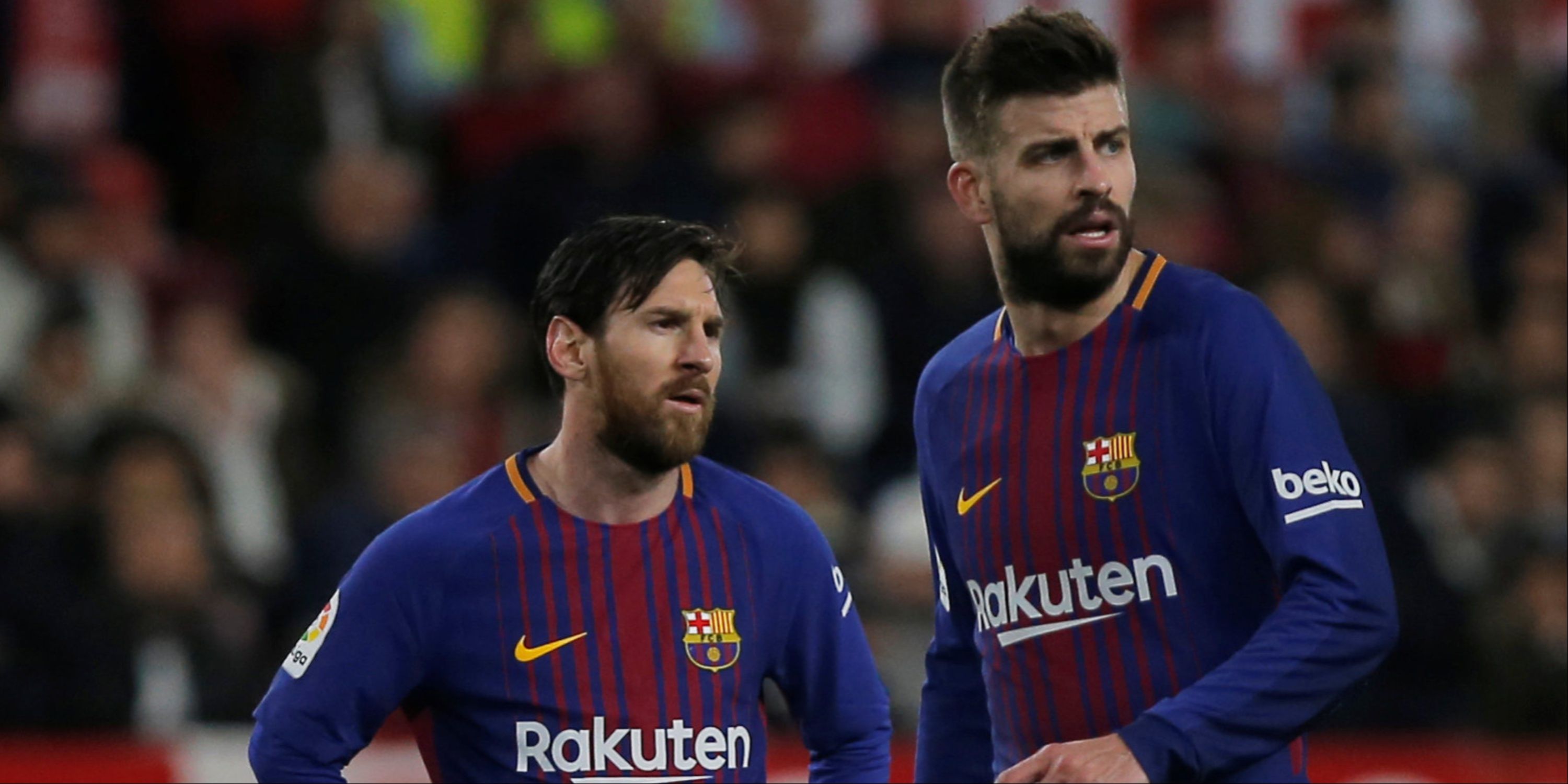 Barcelona's Lionel Messi and Gerard Pique