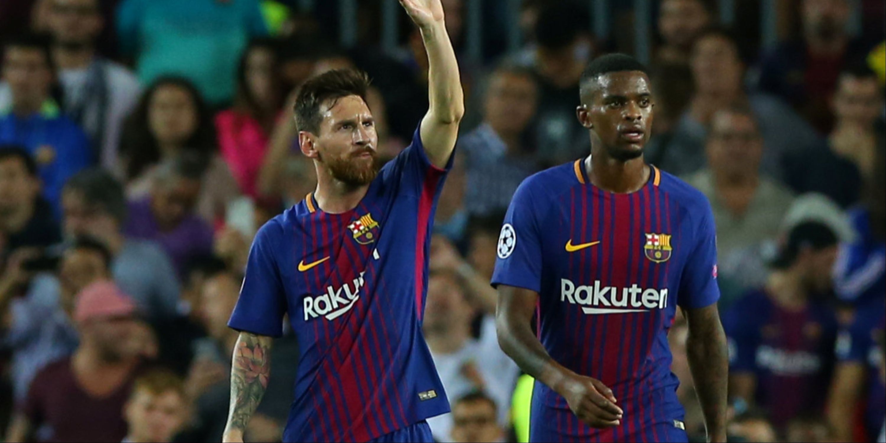 Barcelona’s Lionel Messi with Nelson Semedo
