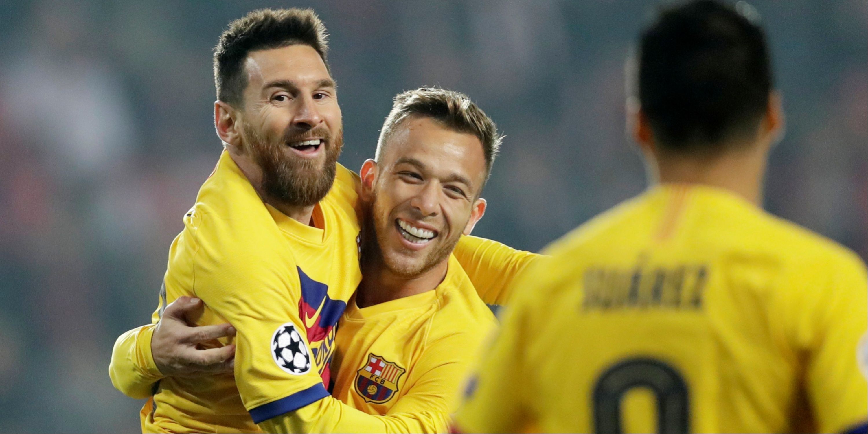 Barcelona's Lionel Messi celebrates with Arthur