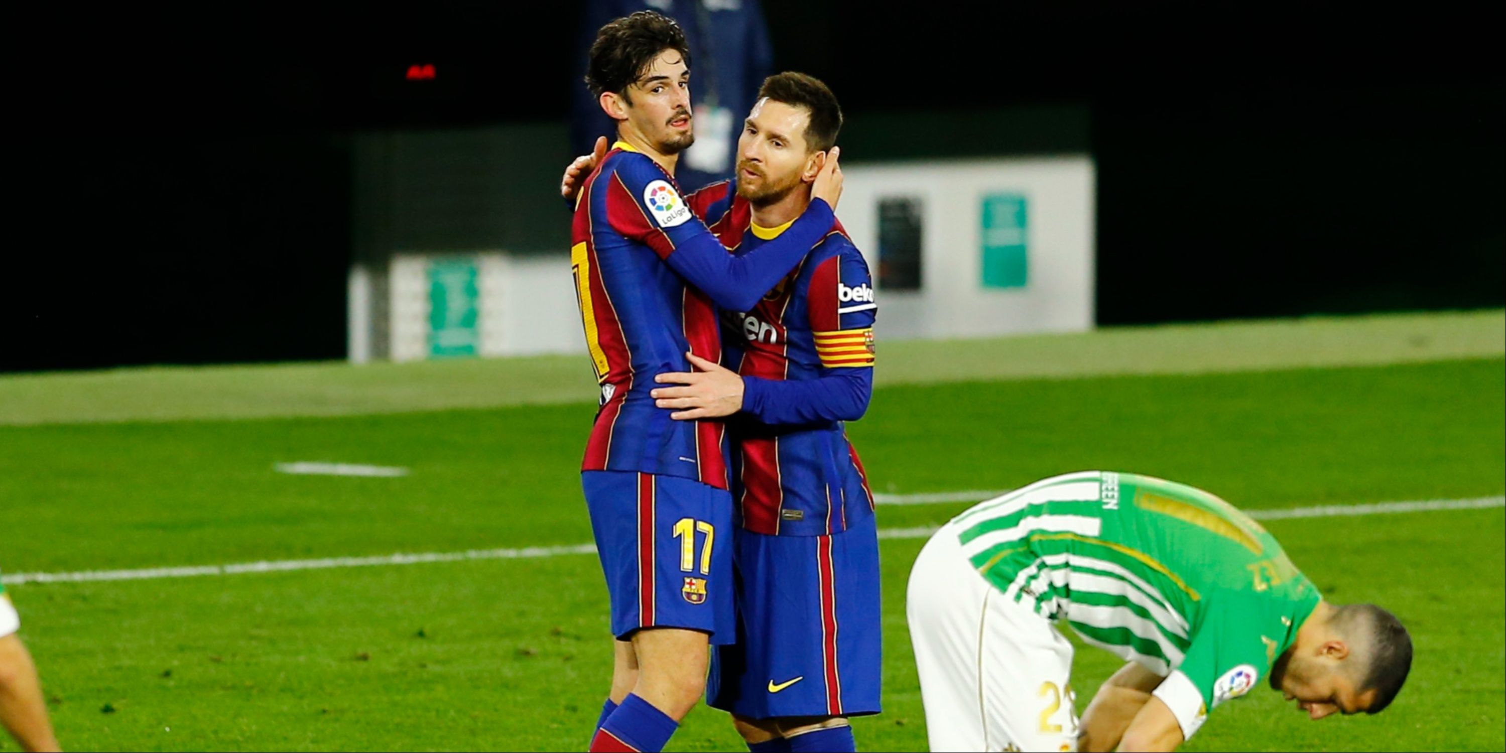 Barcelona's Lionel Messi with Francisco Trincao