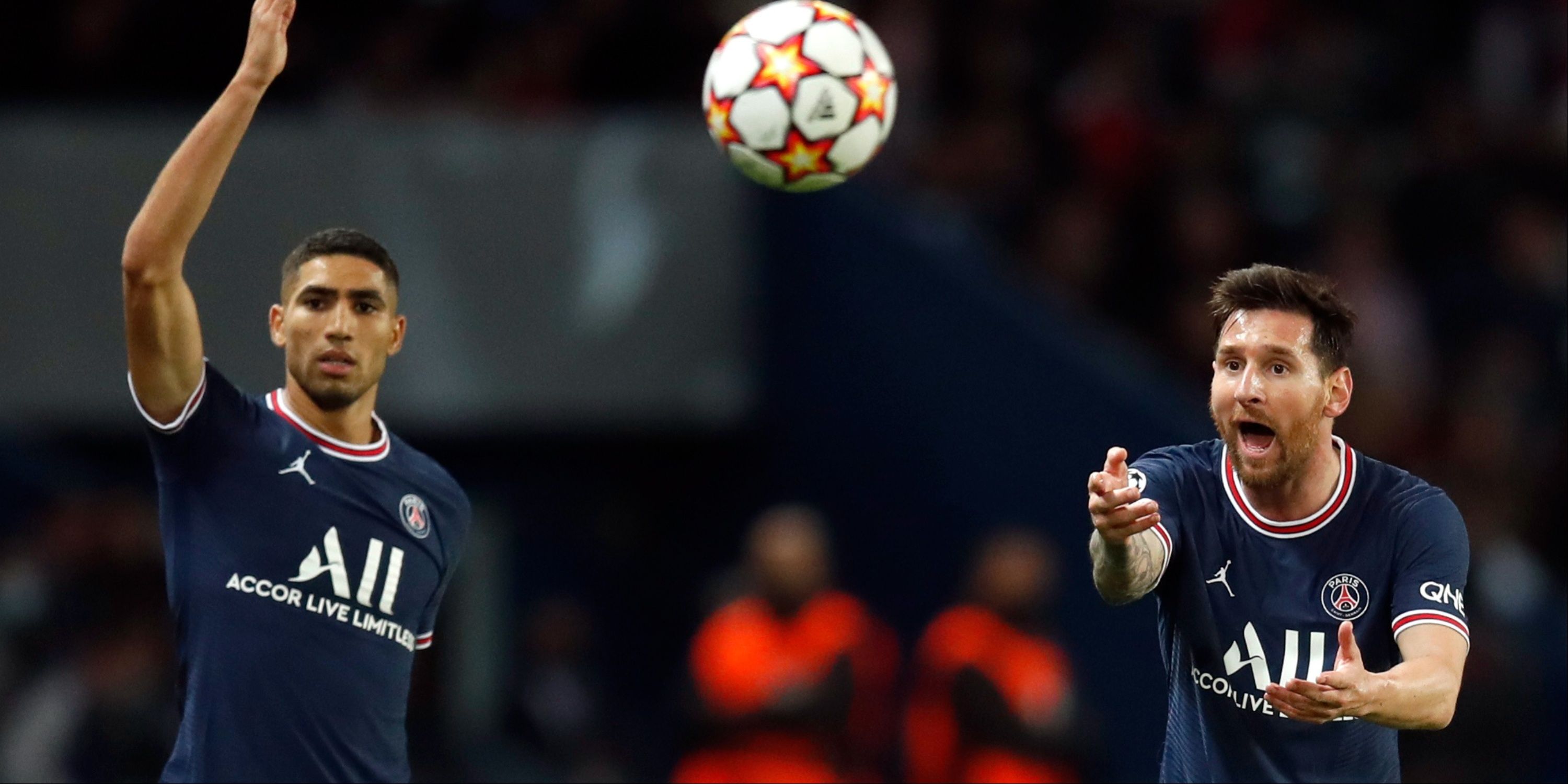 Paris St Germain's Achraf Hakimi with Lionel Messi