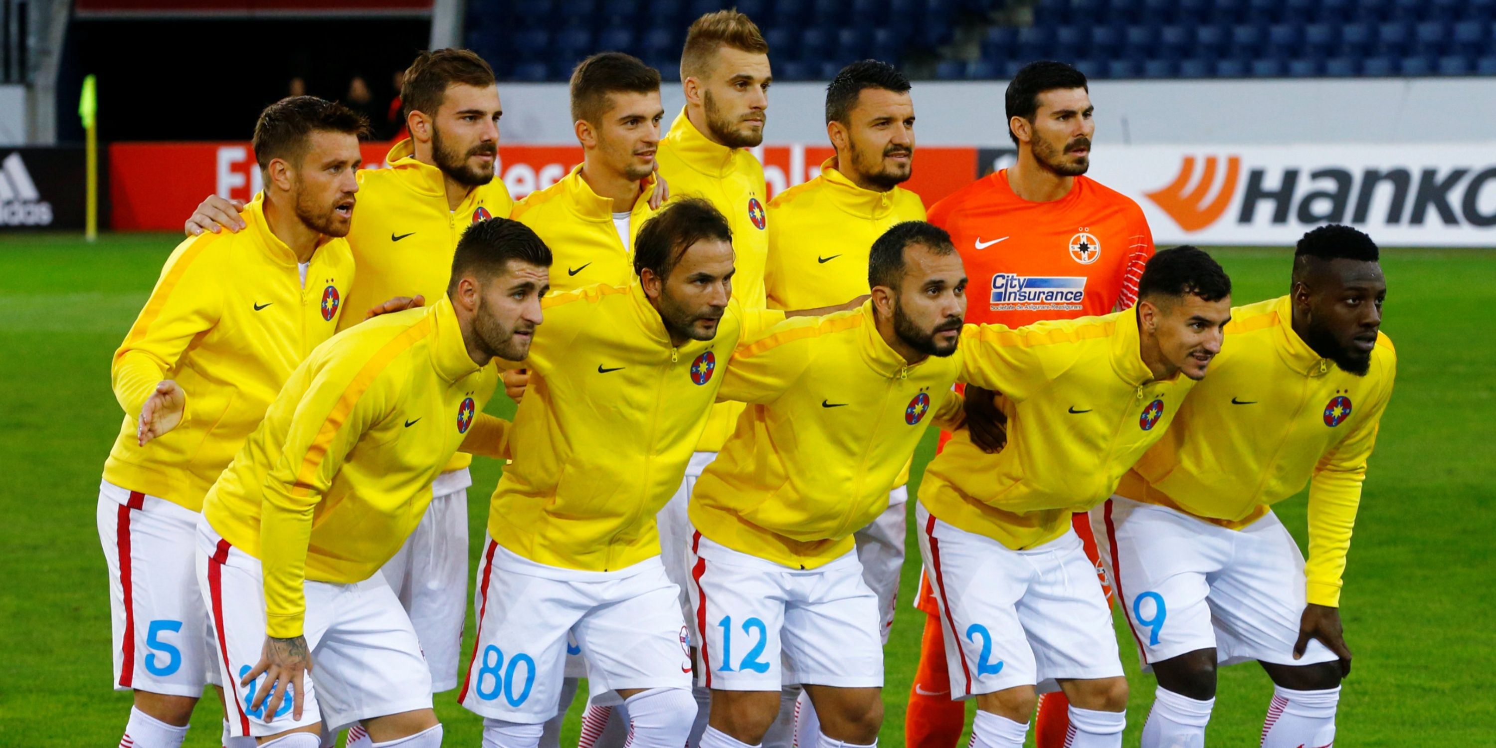 Steaua Bucharest players pose for the pre match photograph.