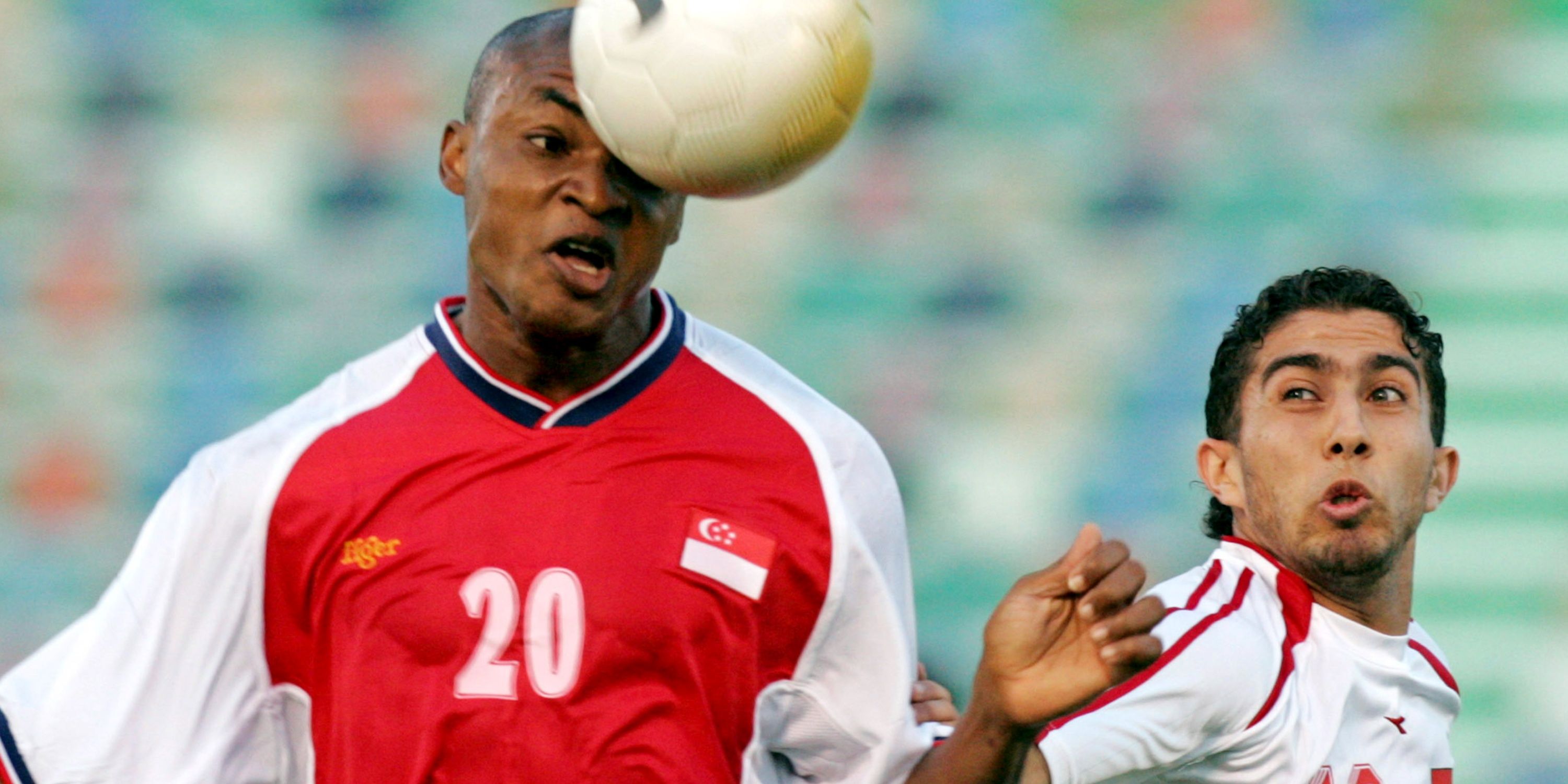 Firas Al-Khatib in action for Syria (right)