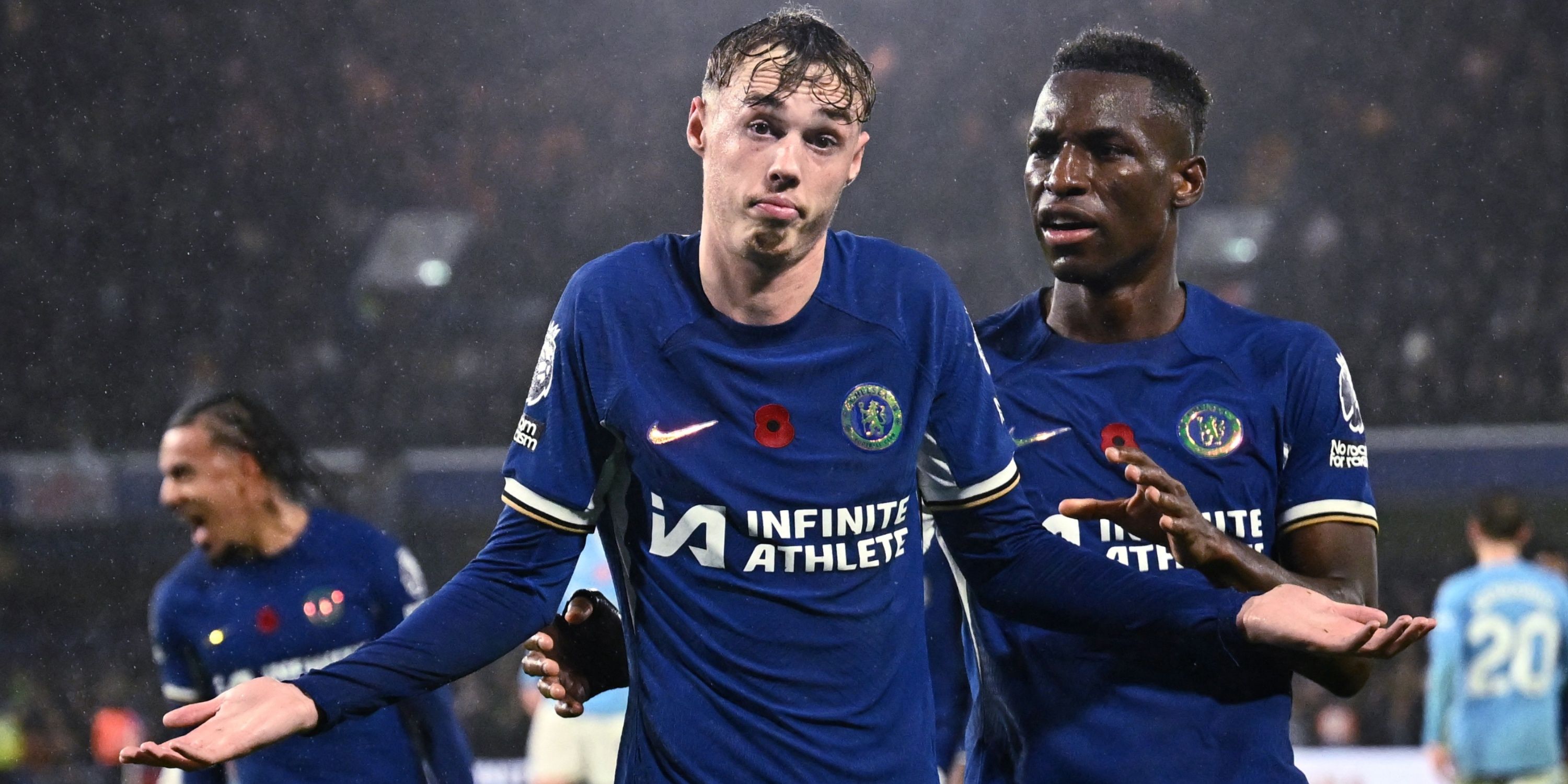  Cole Palmer celebrates scoring a goal with the Cold Palmer pose alongside his Manchester City teammate.