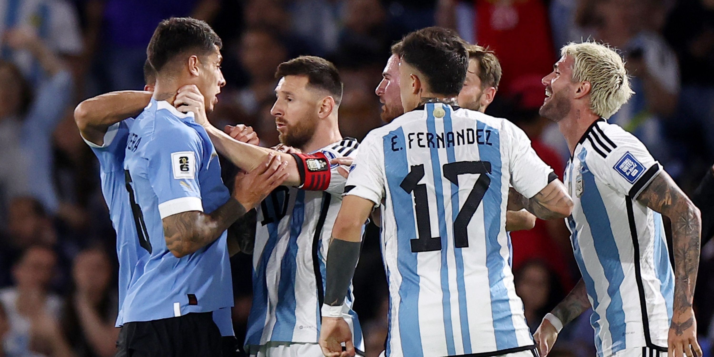 Argentina's Lionel Messi clashes with Uruguay's Mathias Olivera
