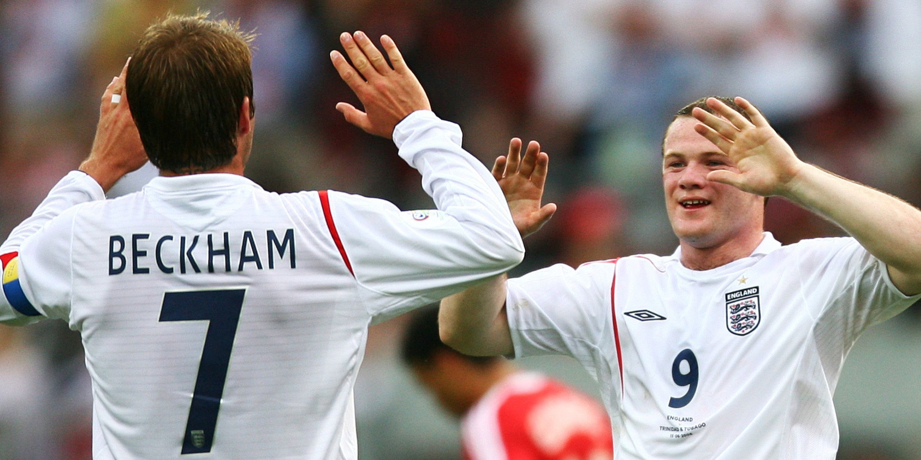 David Beckham and Wayne Rooney in action for England