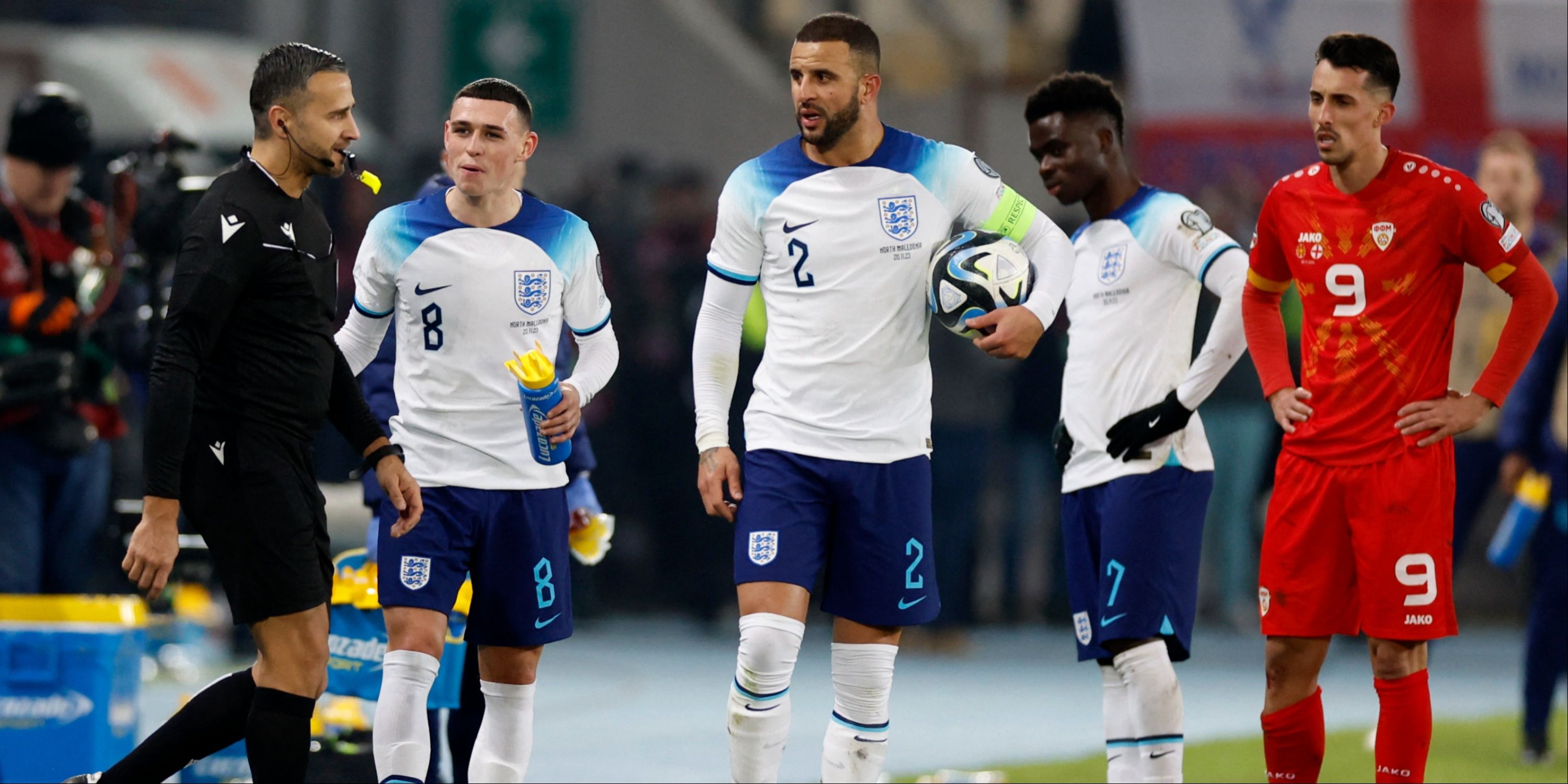 England's Kyle Walker and Phil Foden react as referee Filip Glova awards North Macedonia a penalty