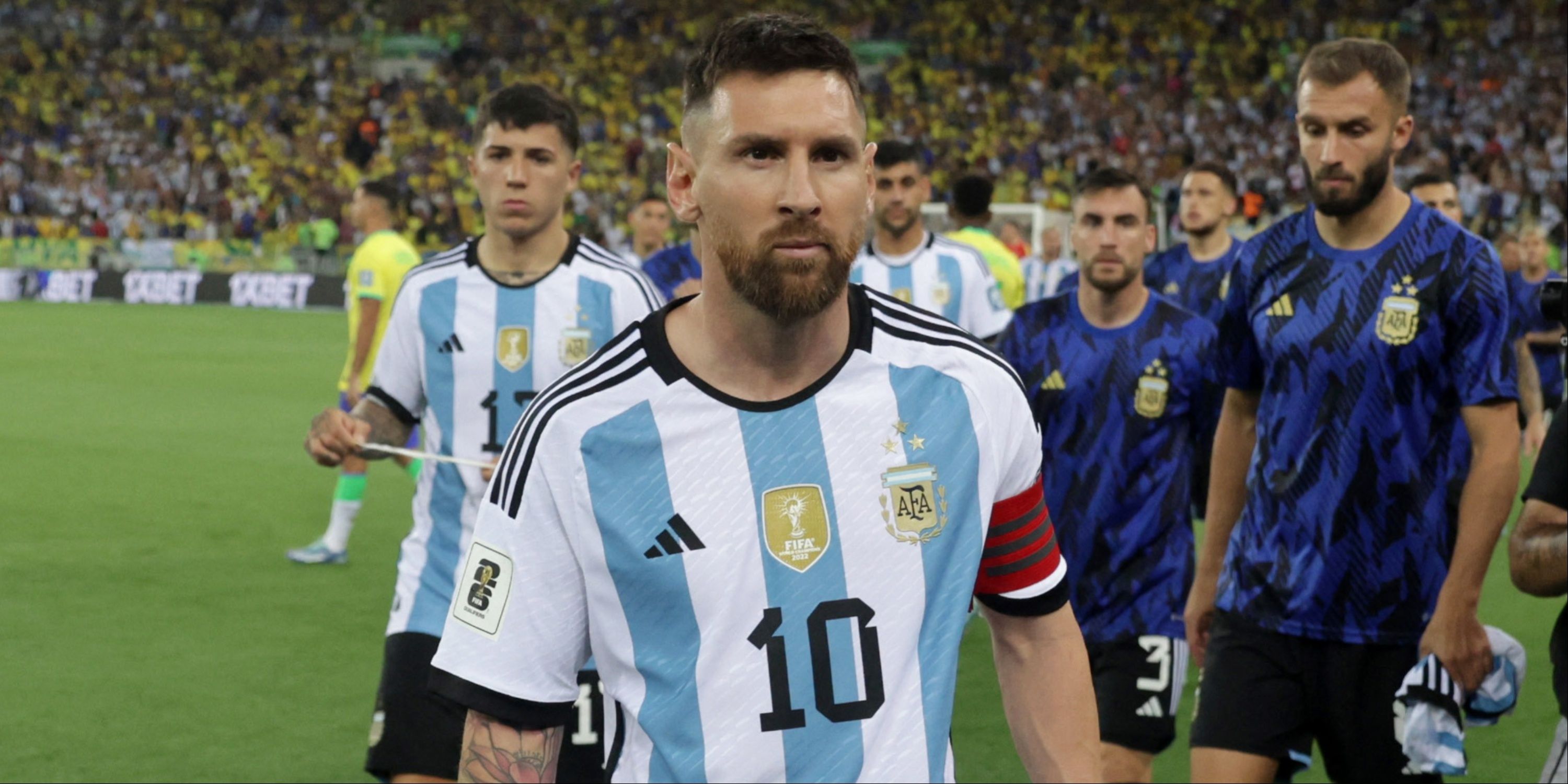 Argentina's Lionel Messi and teammates leave the pitch during Brazil vs Argentina