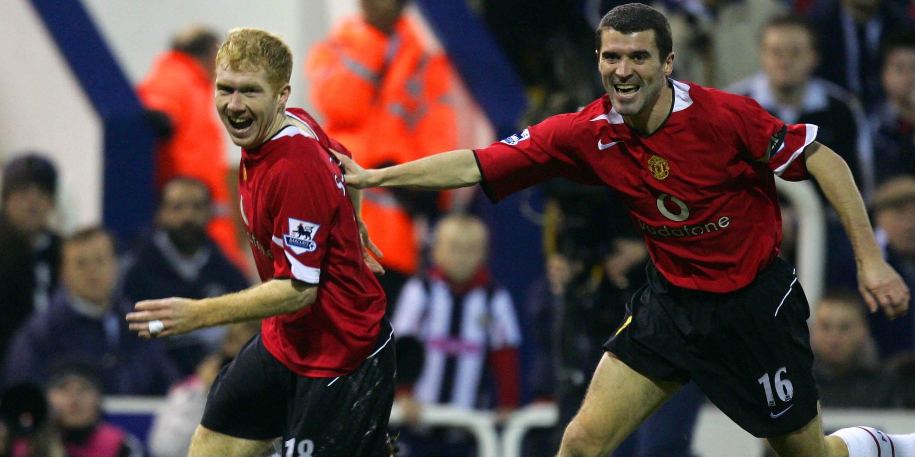Manchester United's Roy Keane celebrates with Paul Scholes