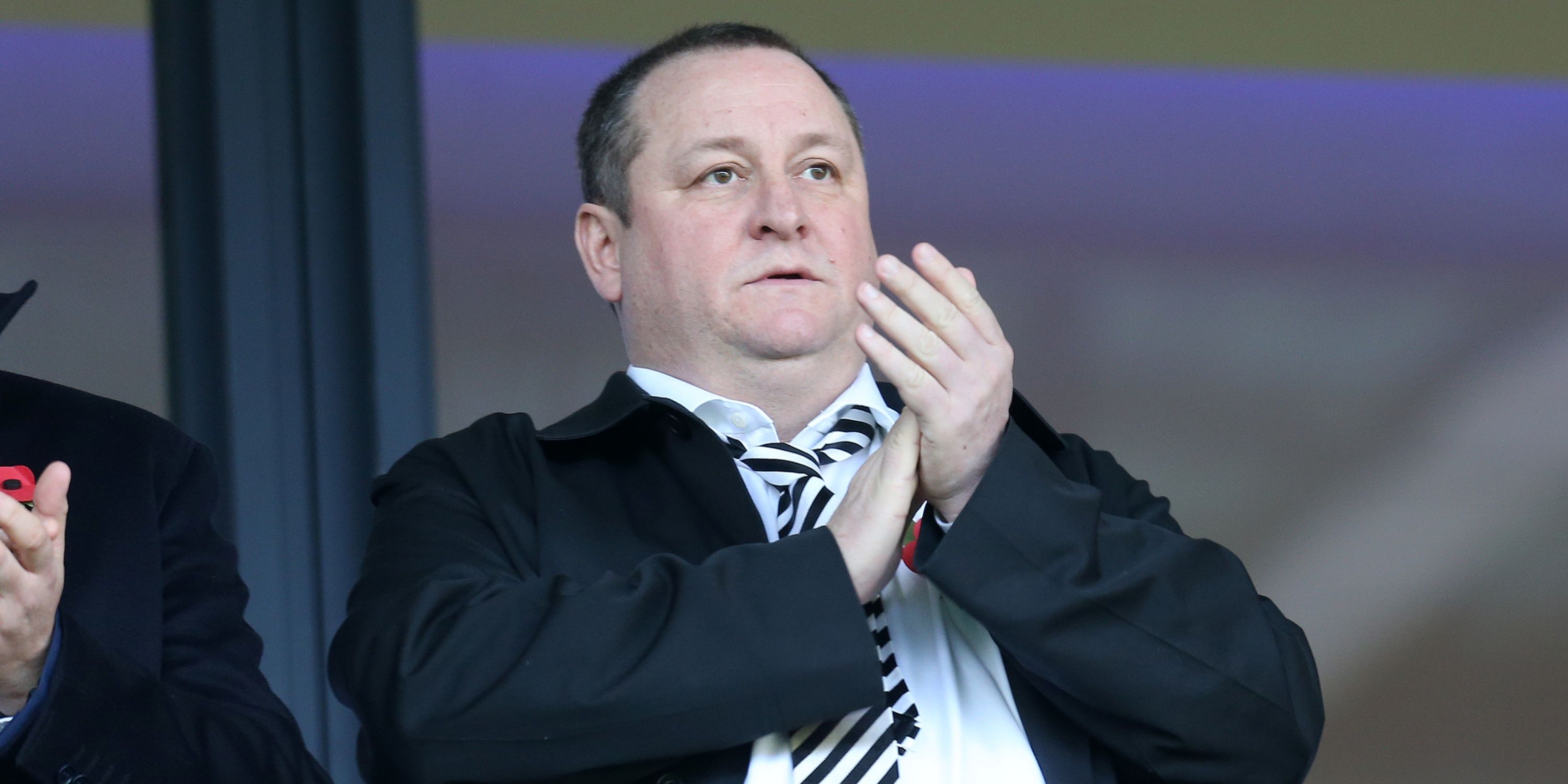 Newcastle owner Mike Ashley looks on