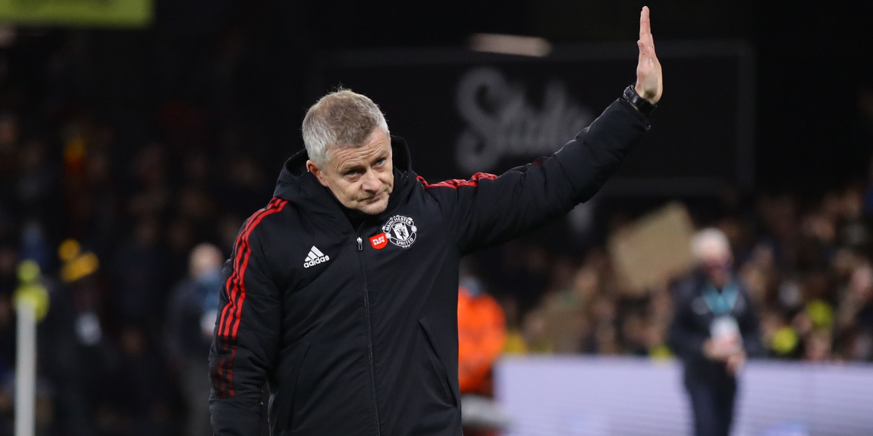 Manchester United manager Ole Gunnar Solskjaer waves to the travelling United supporters at Vicarage Road.