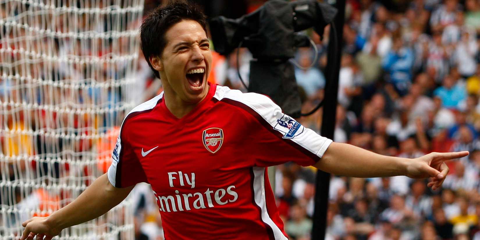 Samir Nasri celebrates scoring for Arsenal. 