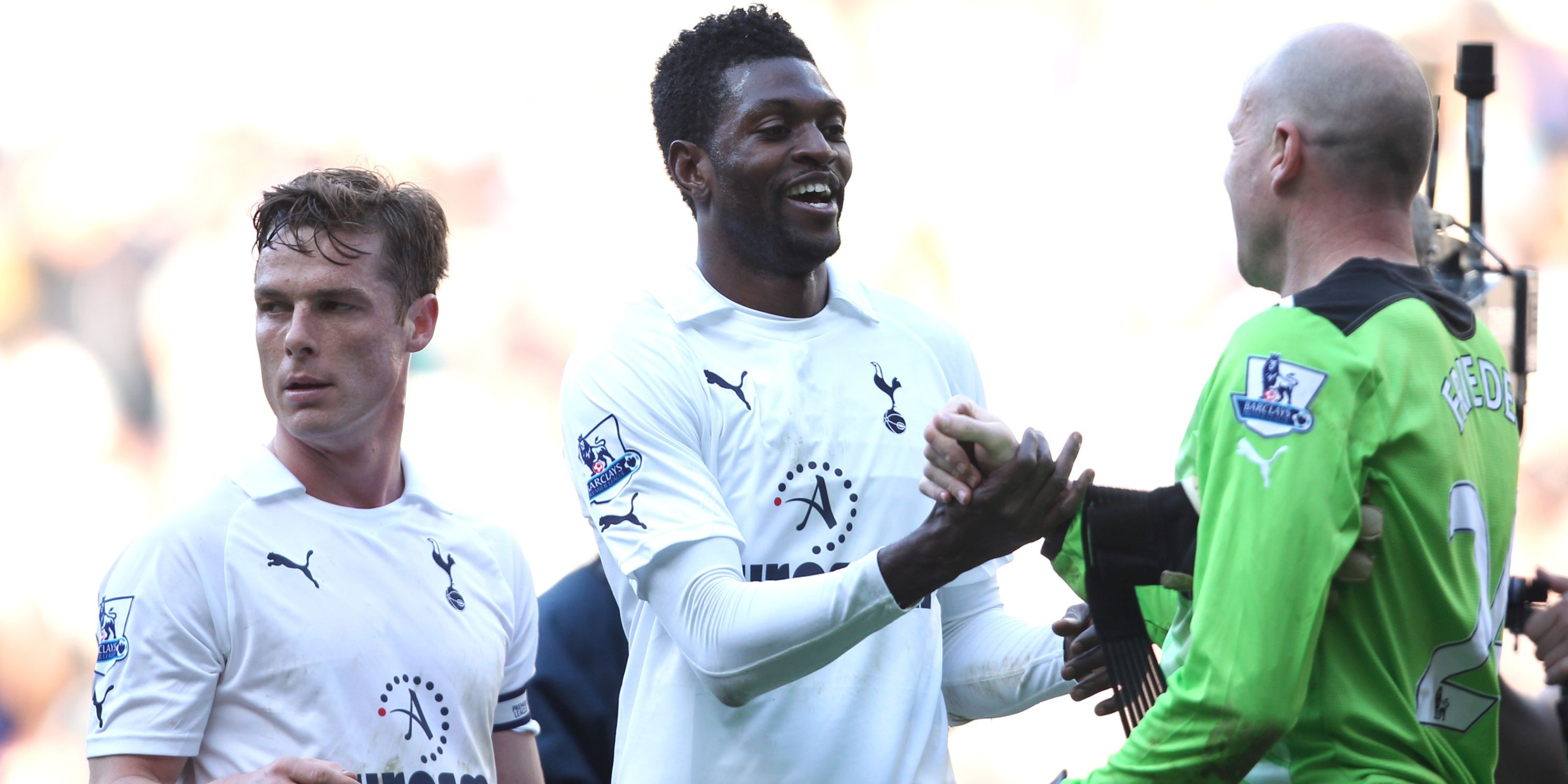 Emmanuel Adebayor congratulates Tottenham Hotspur teammate Brad Friedel.