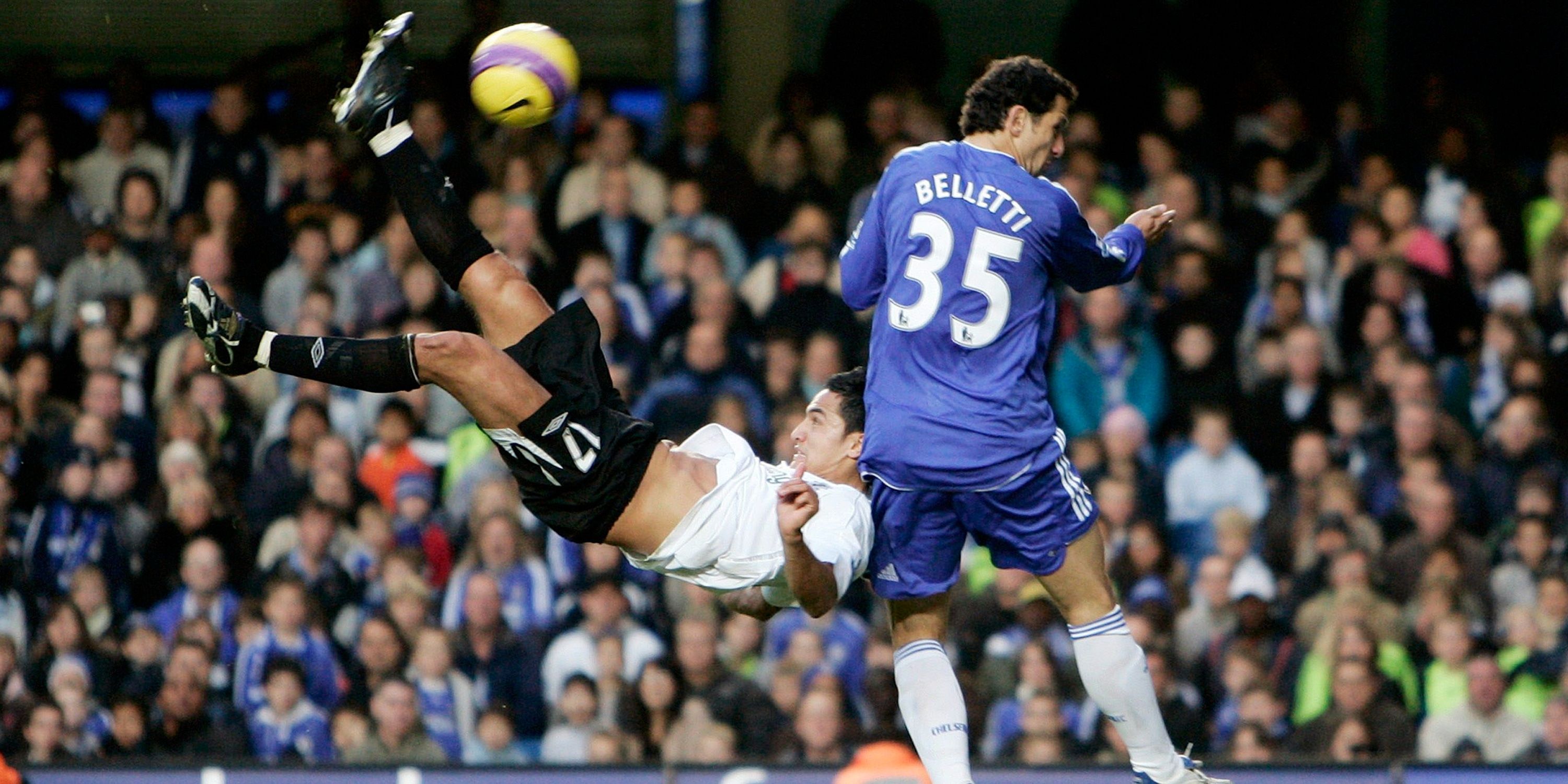 Everton's Tim Cahill pulls off an overhead kick past Chelsea's Juliano Belletti. 