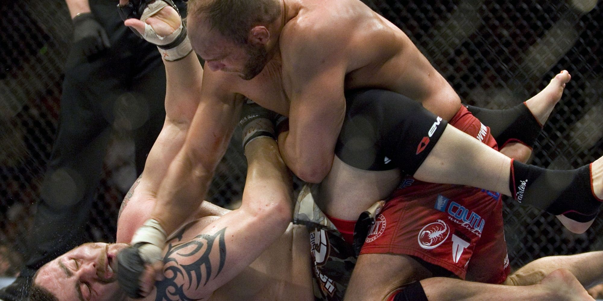 Randy Couture punches a UFC opponent