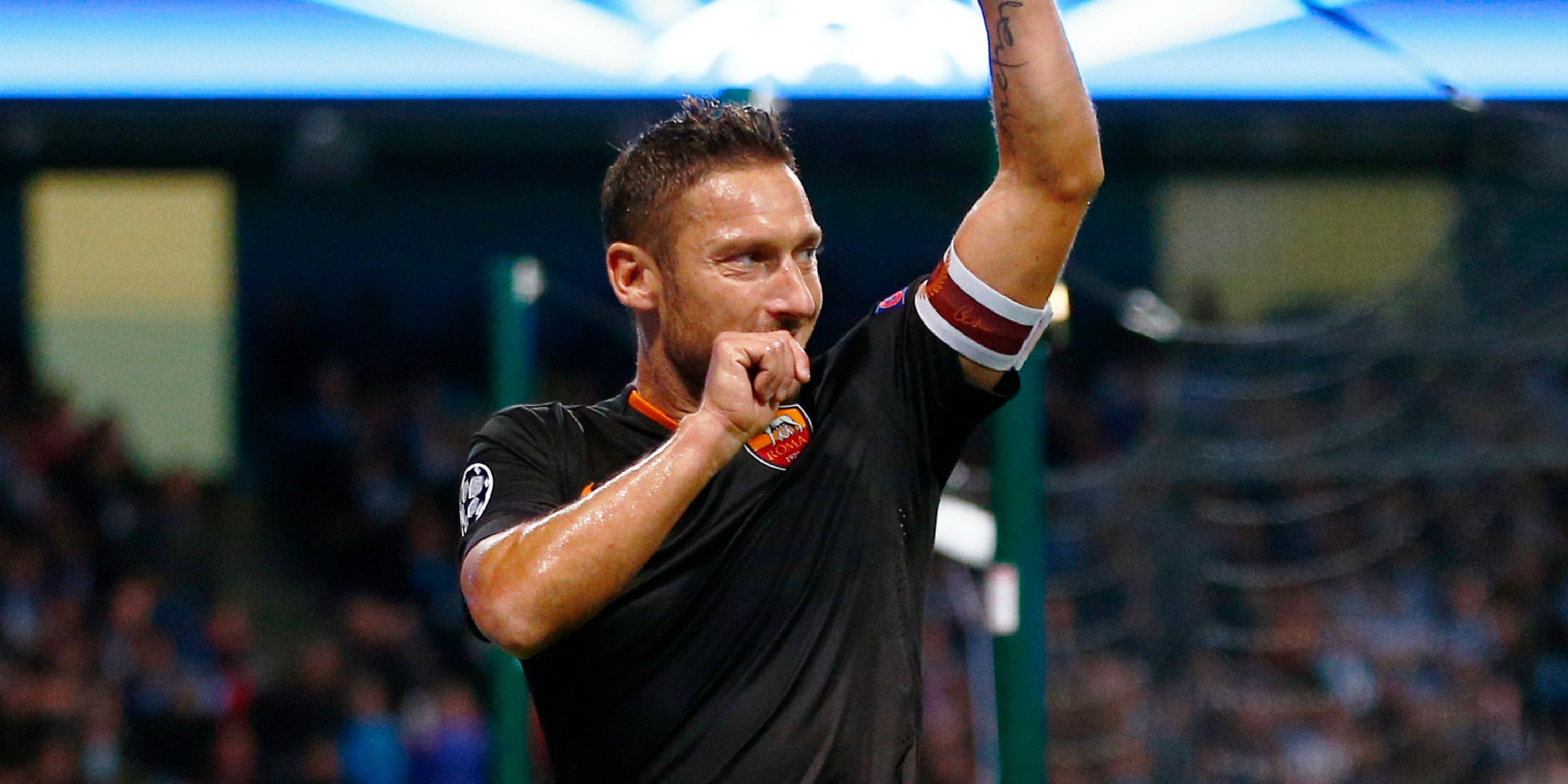 Francesco Totti celebrates scoring for Roma. 