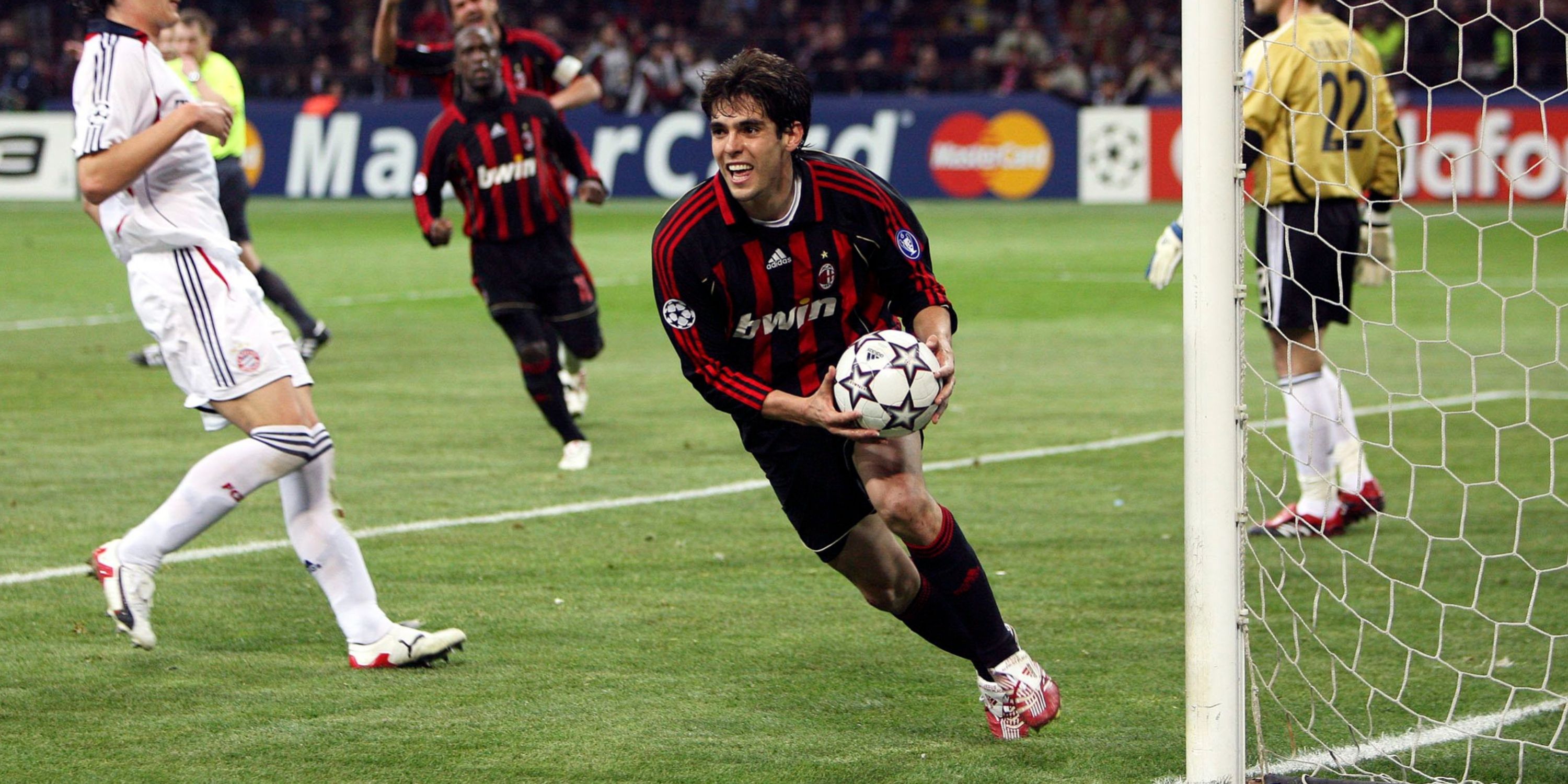 Kaka retrieves the ball after scoring for AC Milan. 