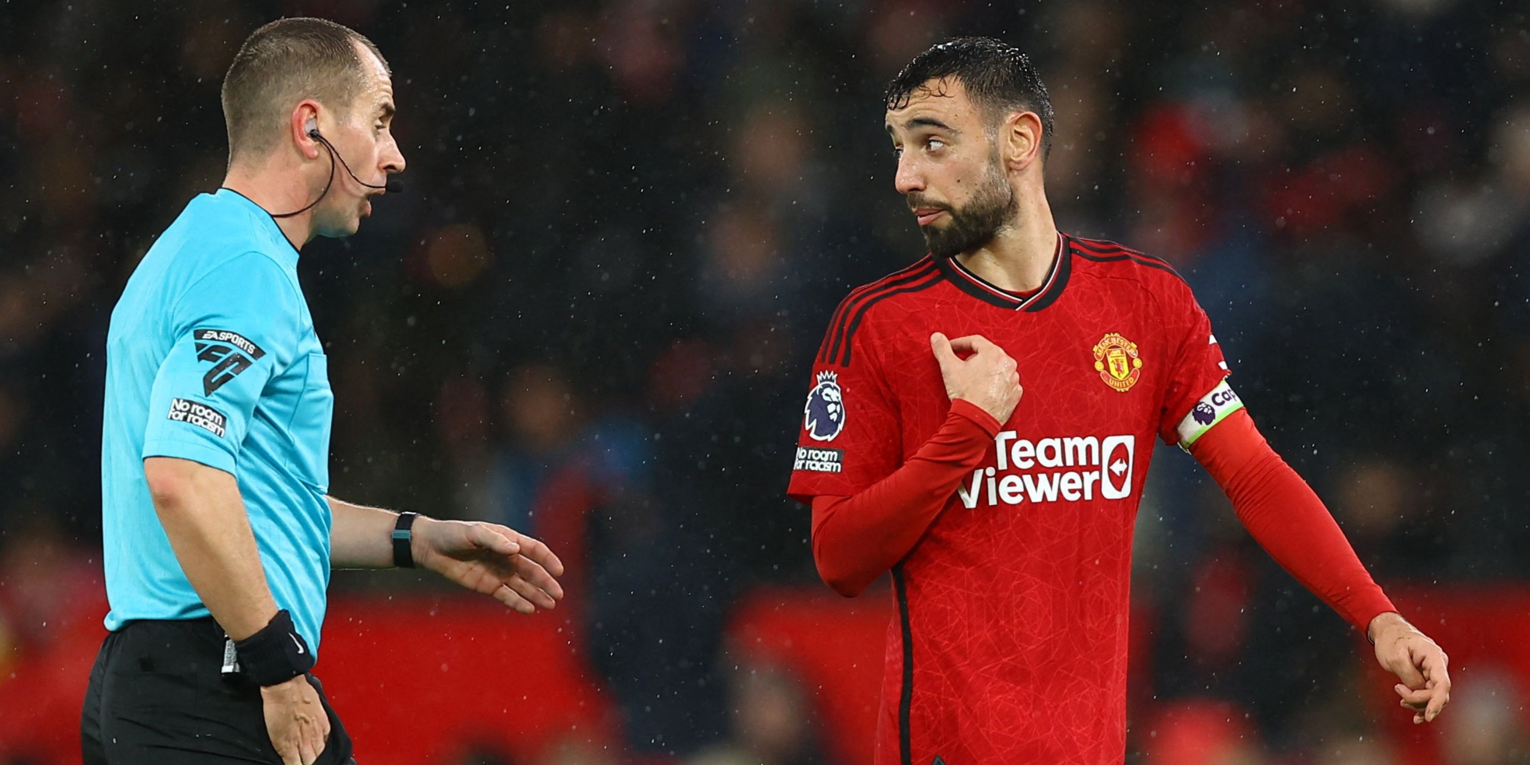 Bruno Fernandes of Manchester United talks with referee Peter Bankes
