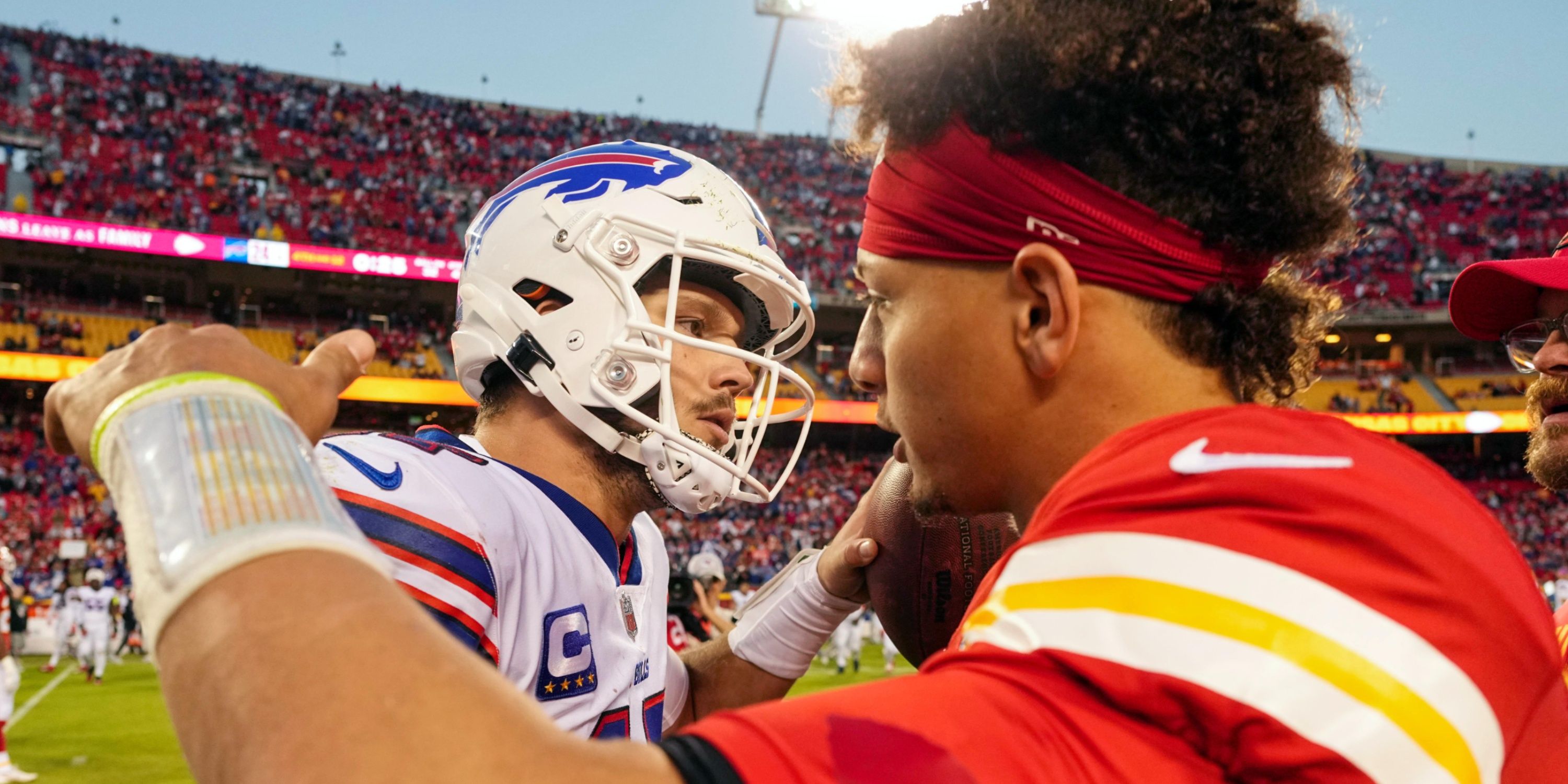 Patrick Mahomes and Josh Allen embrace following a game 