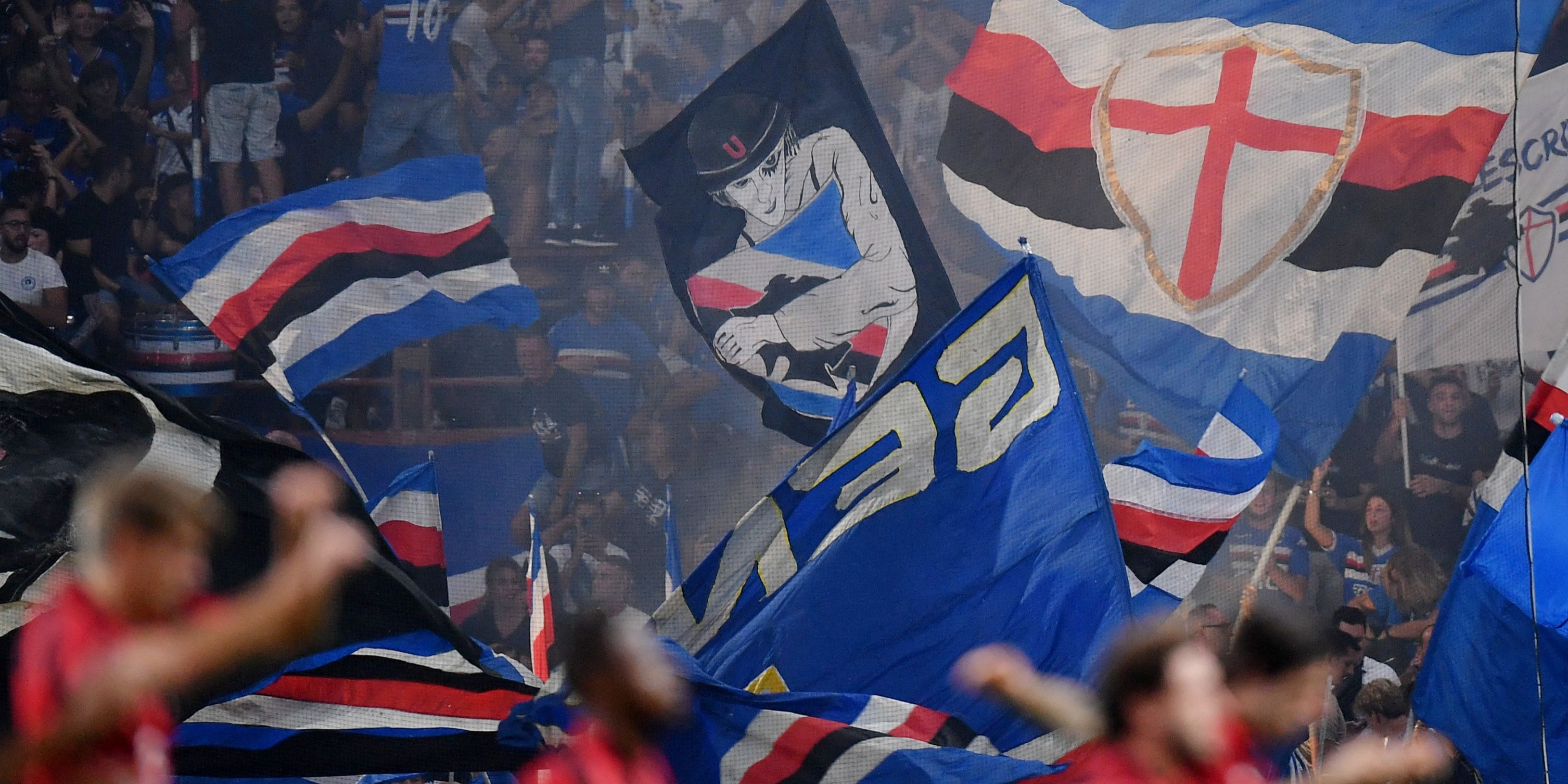 Sampdoria fans waving flags.