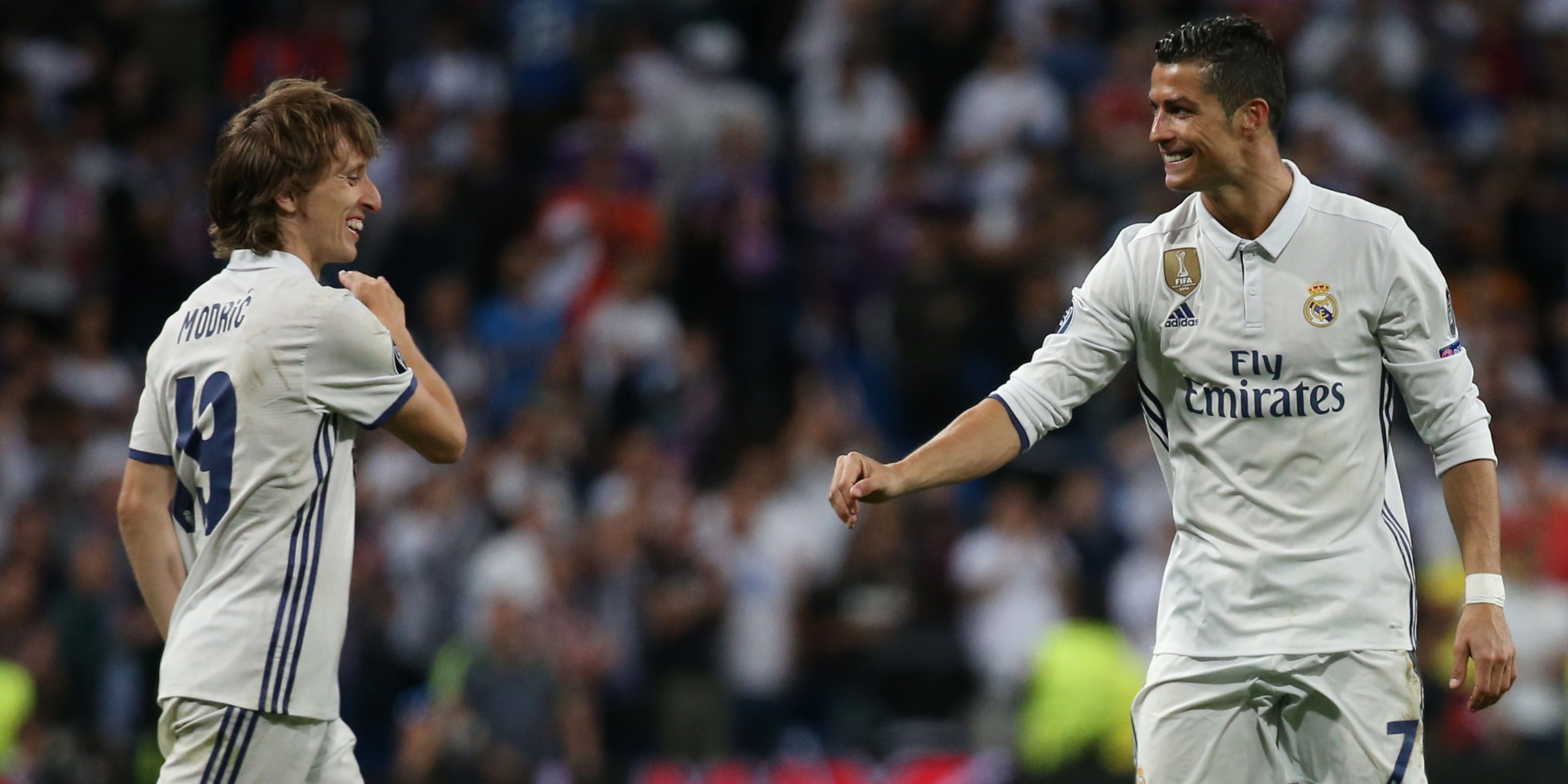 Real Madrid's Cristiano Ronaldo celebrates scoring with Luka Modric