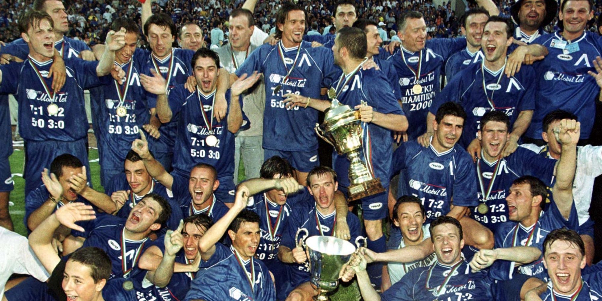 Players of Levski Sofia pose for the press with the Champions Cup of the Bulgarian soccer championship