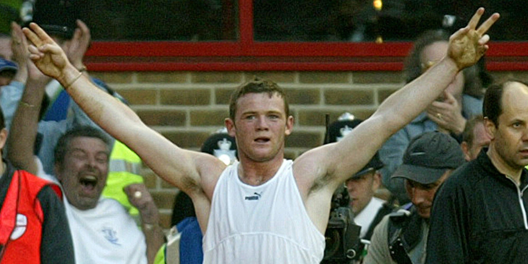 Everton's Wayne Rooney celebrates scoring against Arsenal