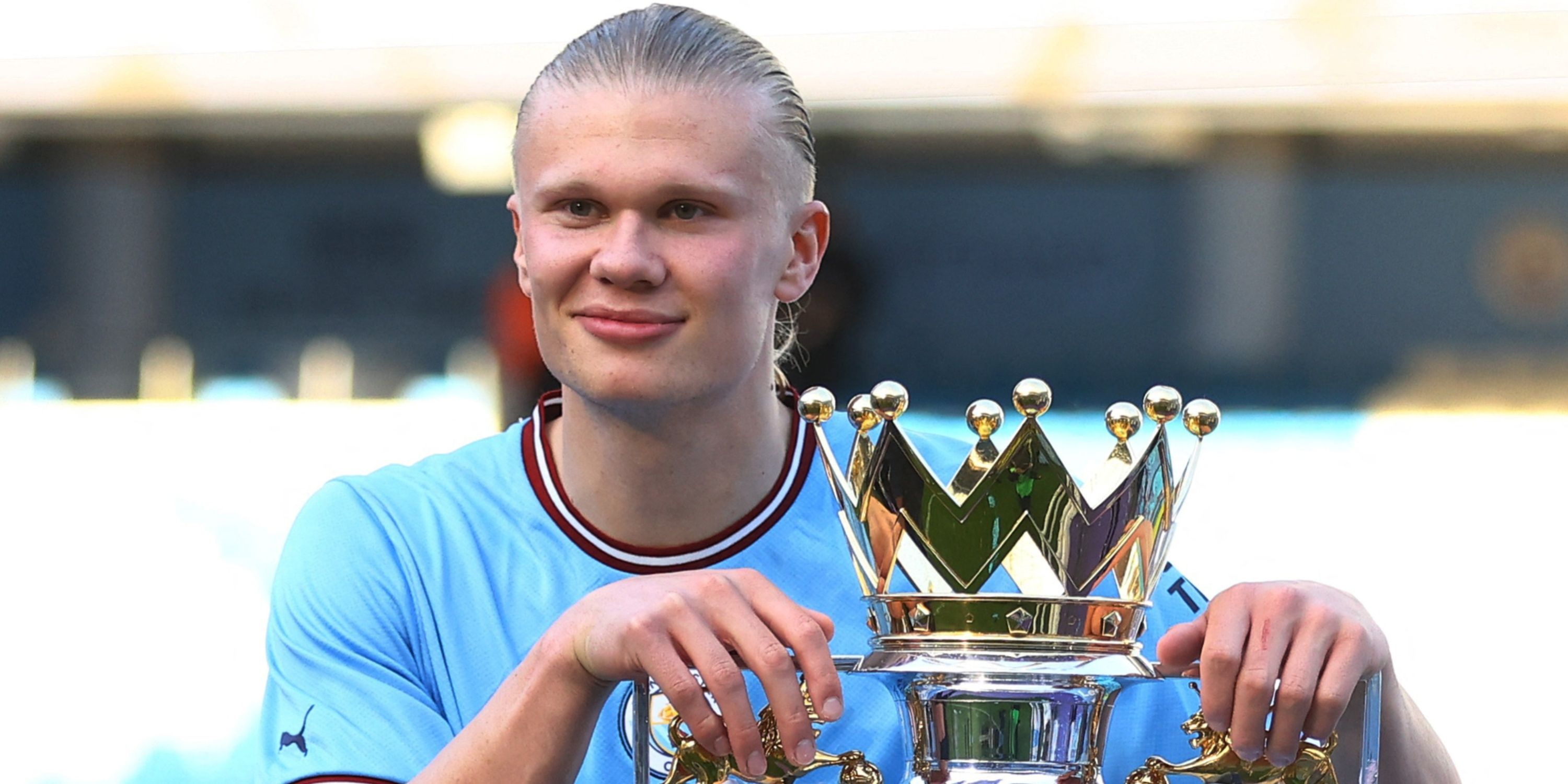 Erling Haaland with the Premier League trophy