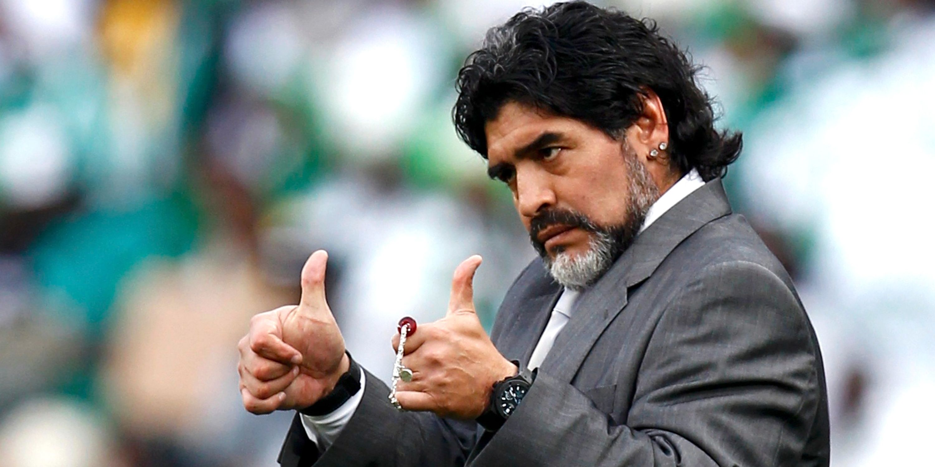 Diego Maradona wearing two watches