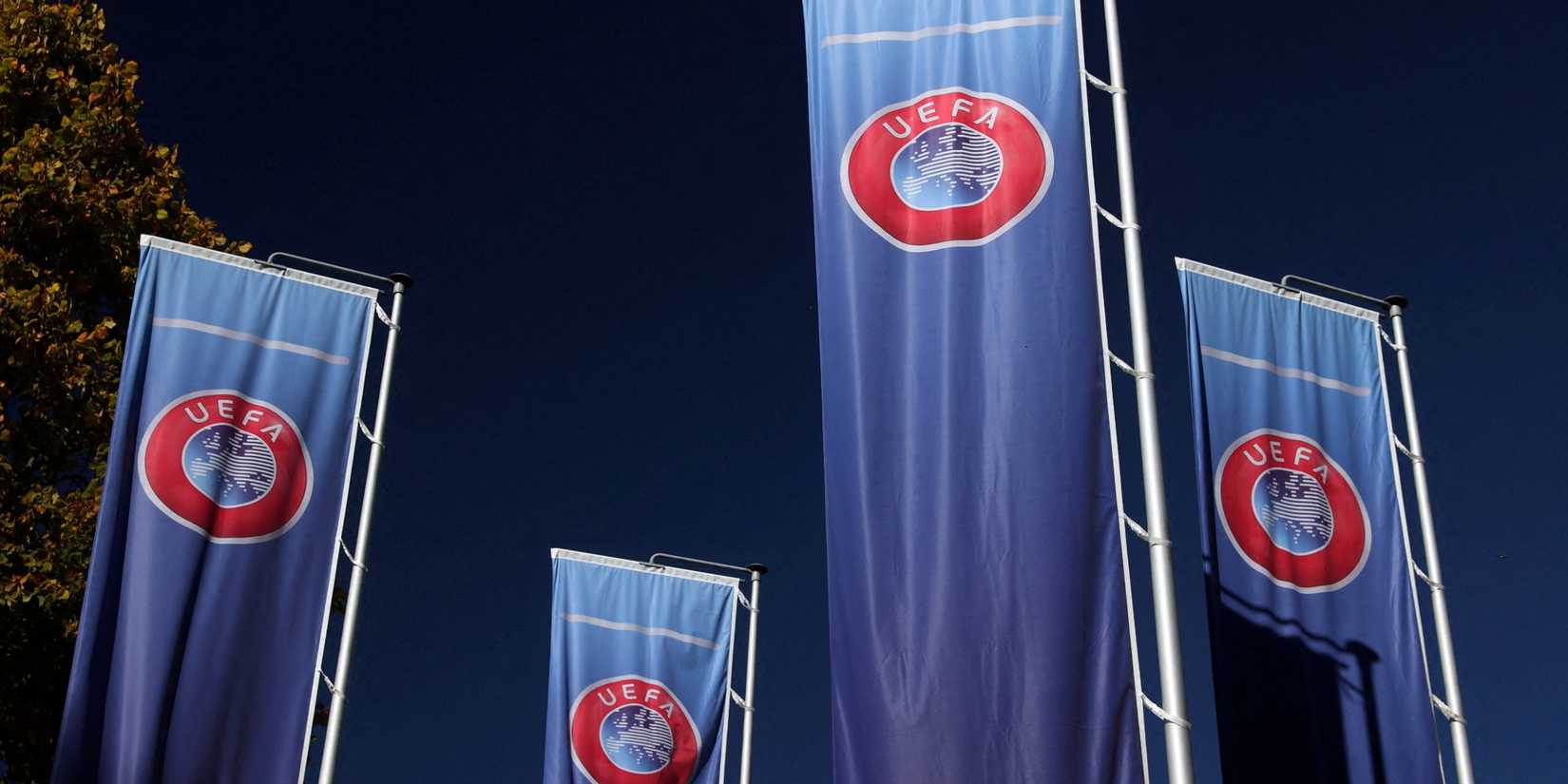Flags bearing the crest of UEFA, European football's governing body