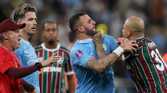 Manchester City's Kyle Walker clashes with Fluminense's Felipe Melo 