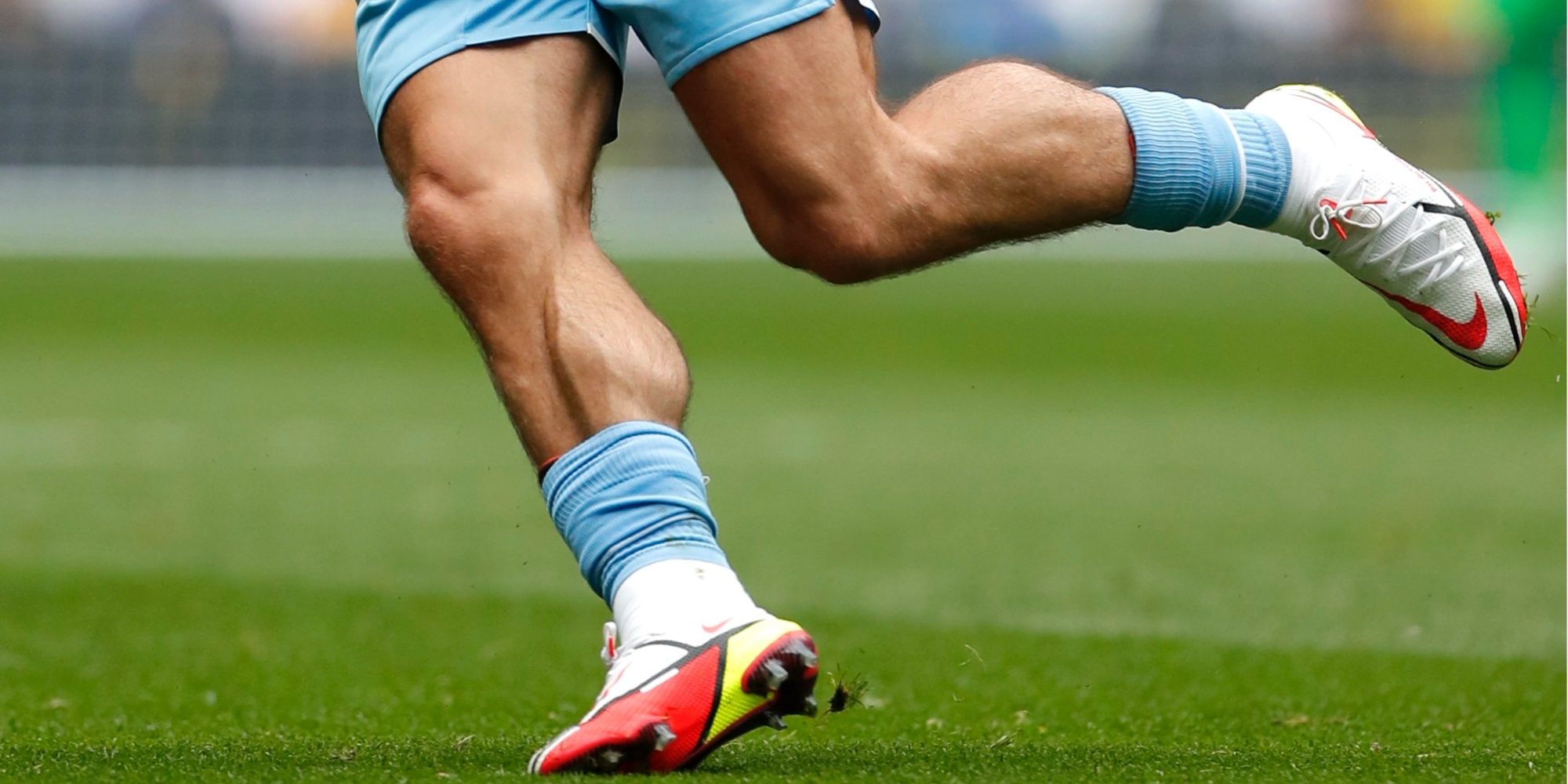 I've heard of players wearing their own socks under the official socks and  even cutting the base off or using tape. Yet I don't think I'd ever seen  this before. Arsenal's socks