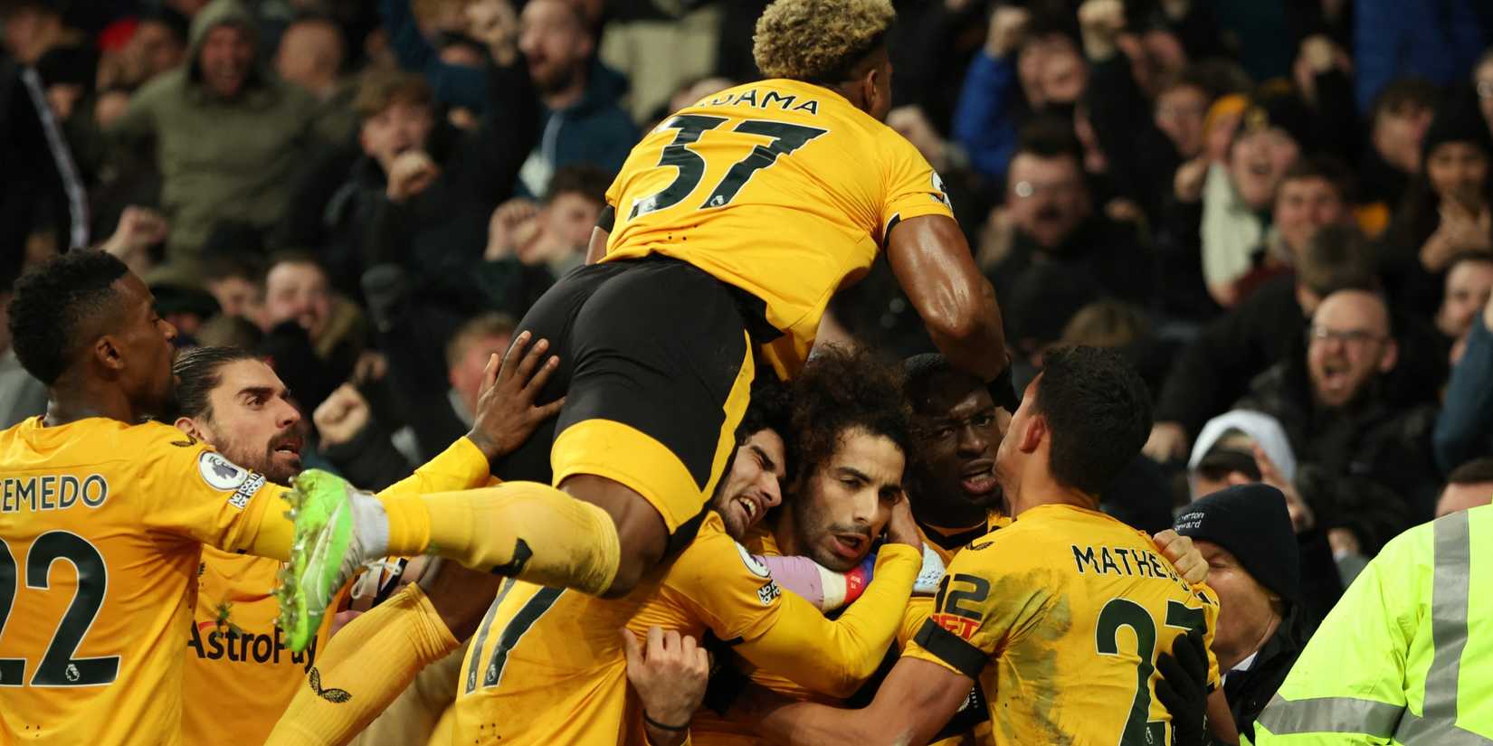 Wolverhampton Wanderers' Rayan Ait-Nouri celebrates scoring Wolves' second goal with teammates