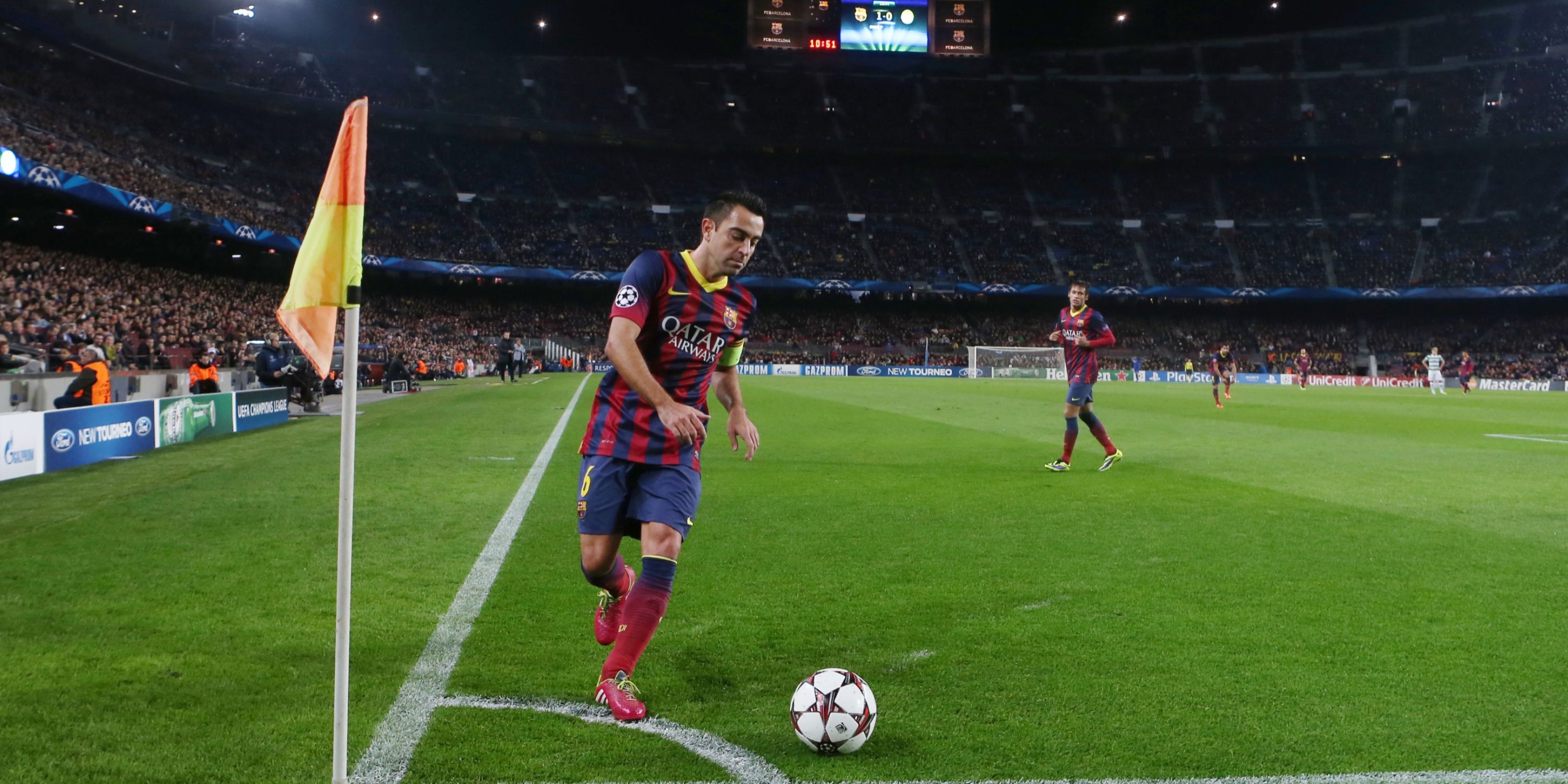 Xavi prepares to take a corner for Barcelona. 