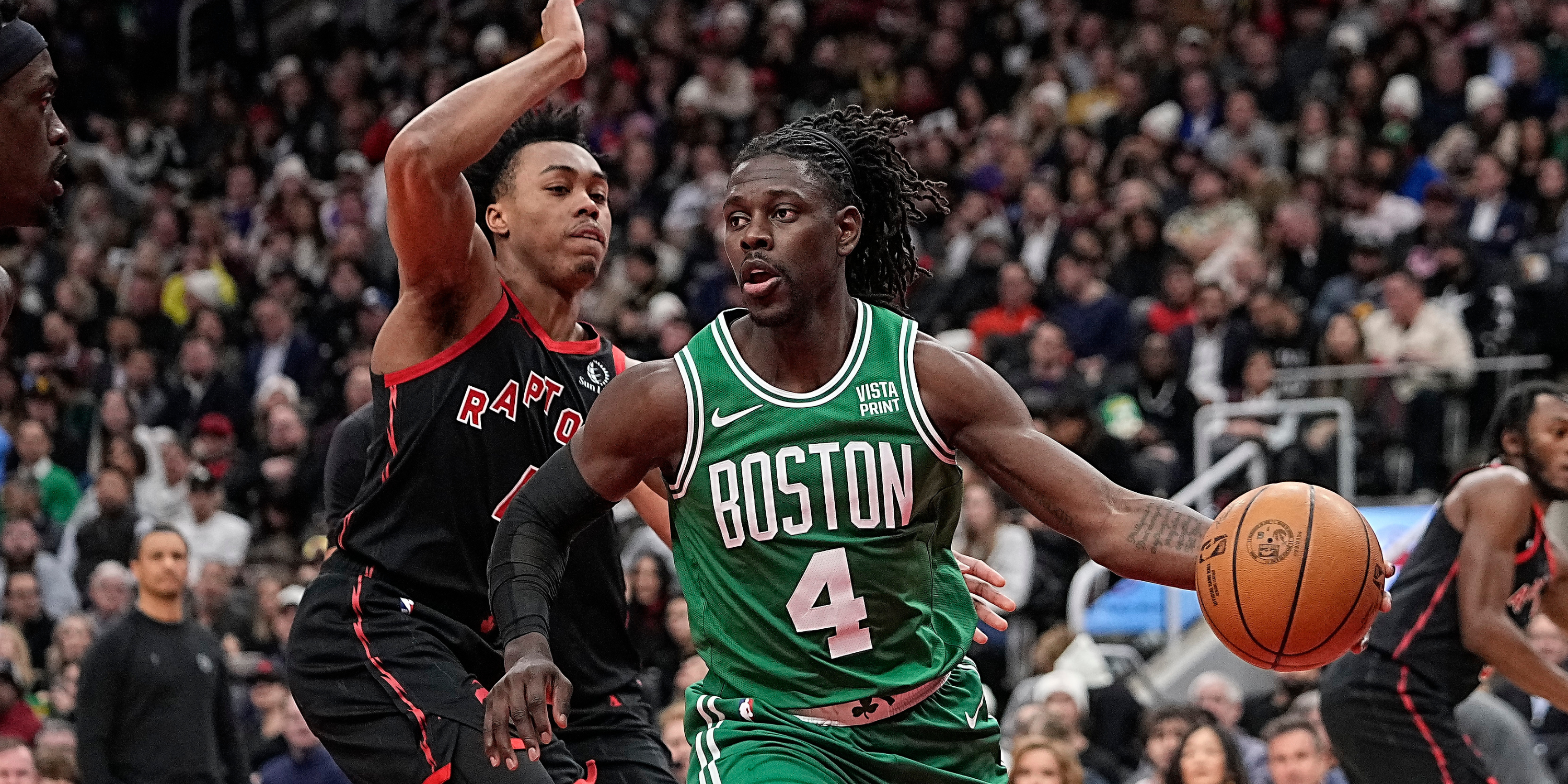 Scottie Barnes guards Jrue Holiday