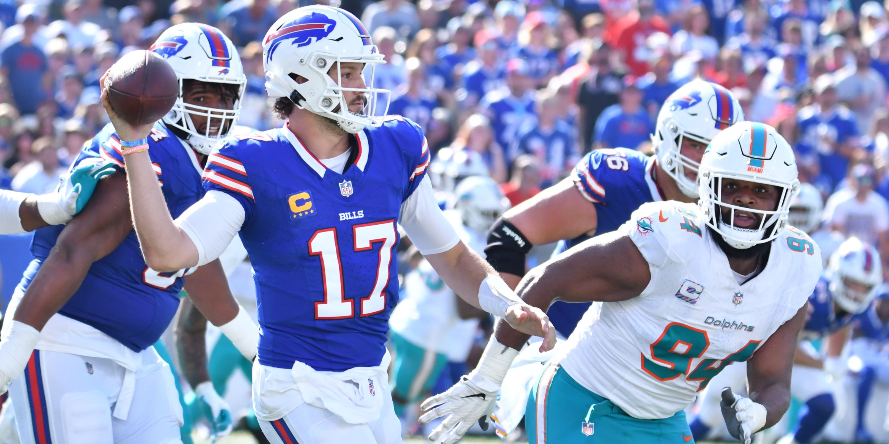 Josh Allen looks to throw a pass against the Miami Dolphins