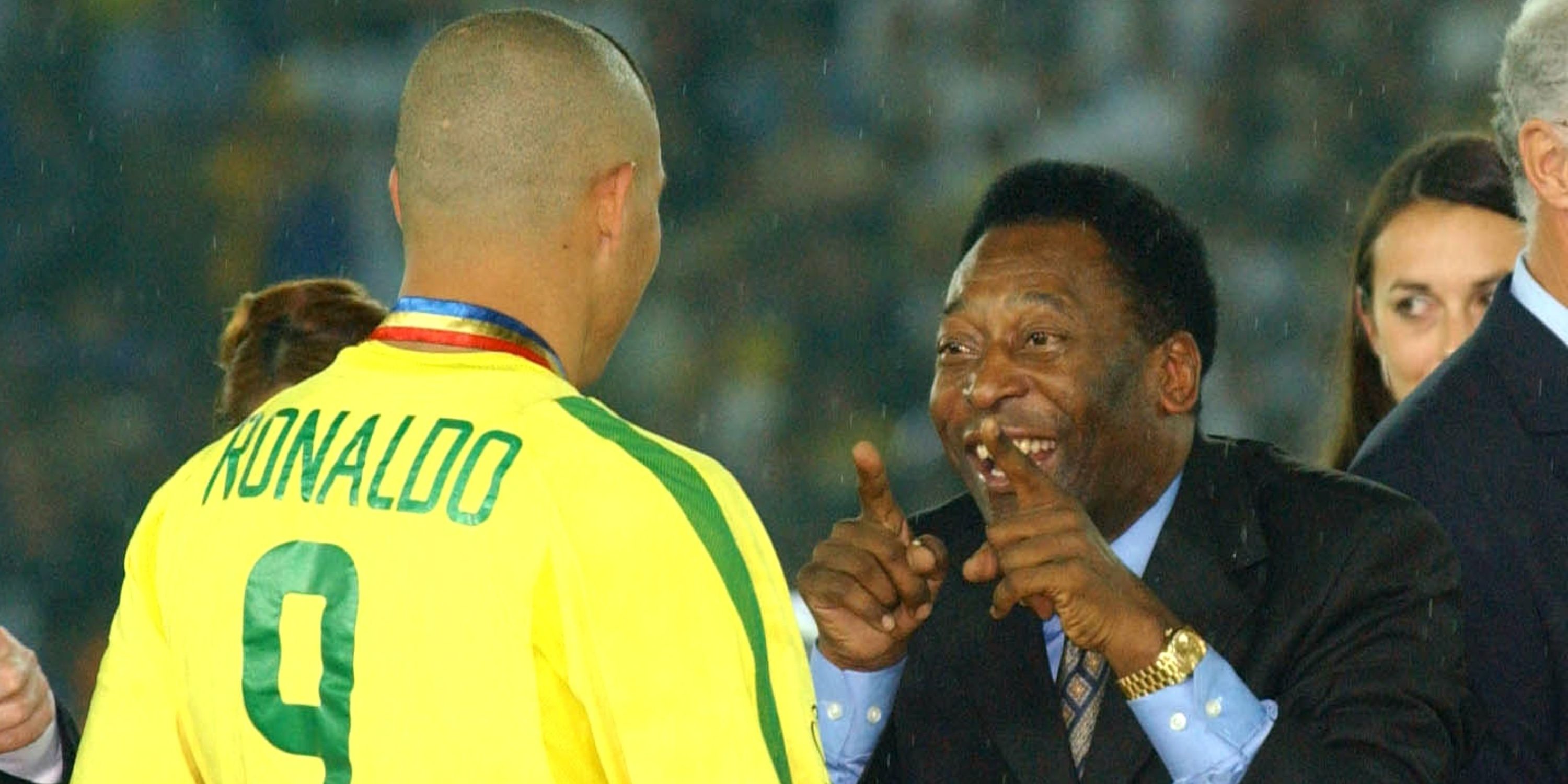 Pele celebrates with Ronaldo after Brazil's World Cup triumph in 2002.