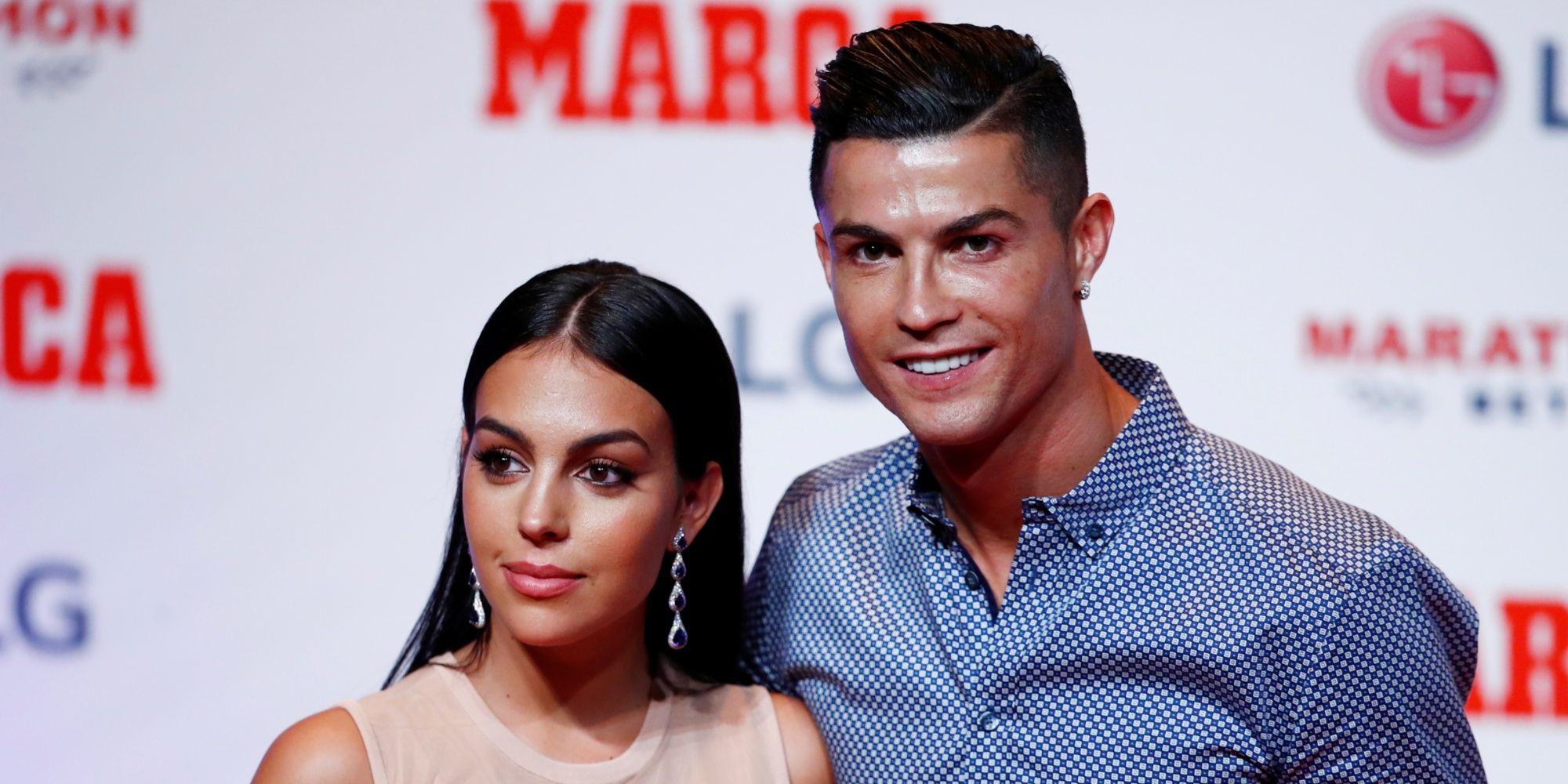 Cristiano Ronaldo poses with partner Georgina Rodriguez