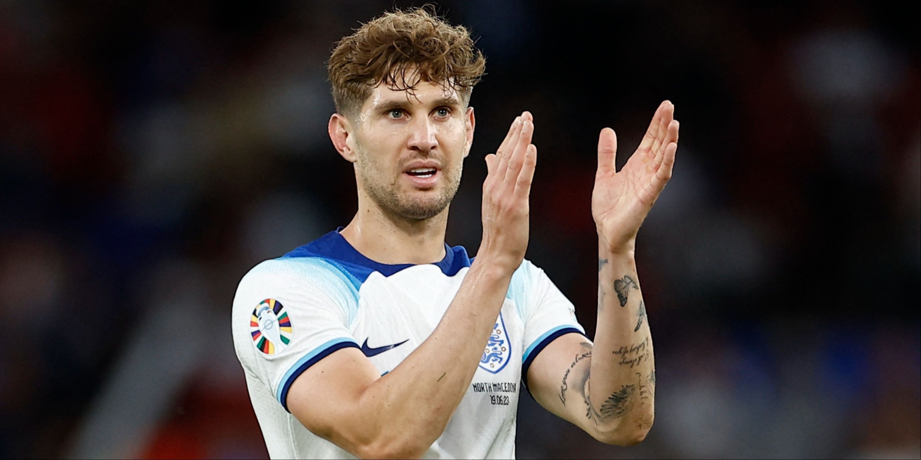 John Stones applauds