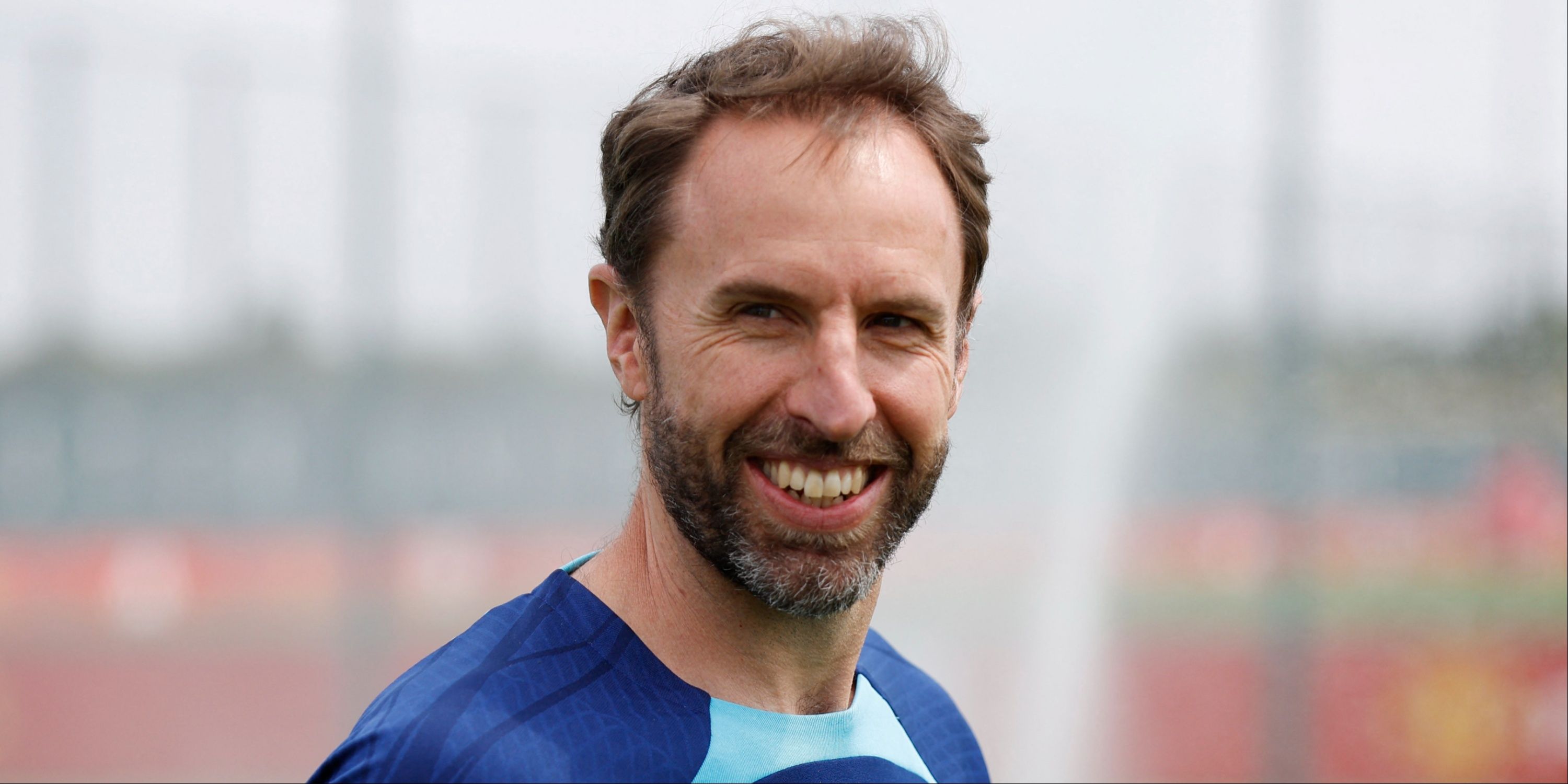 England manager Gareth Southgate smiling during a training session