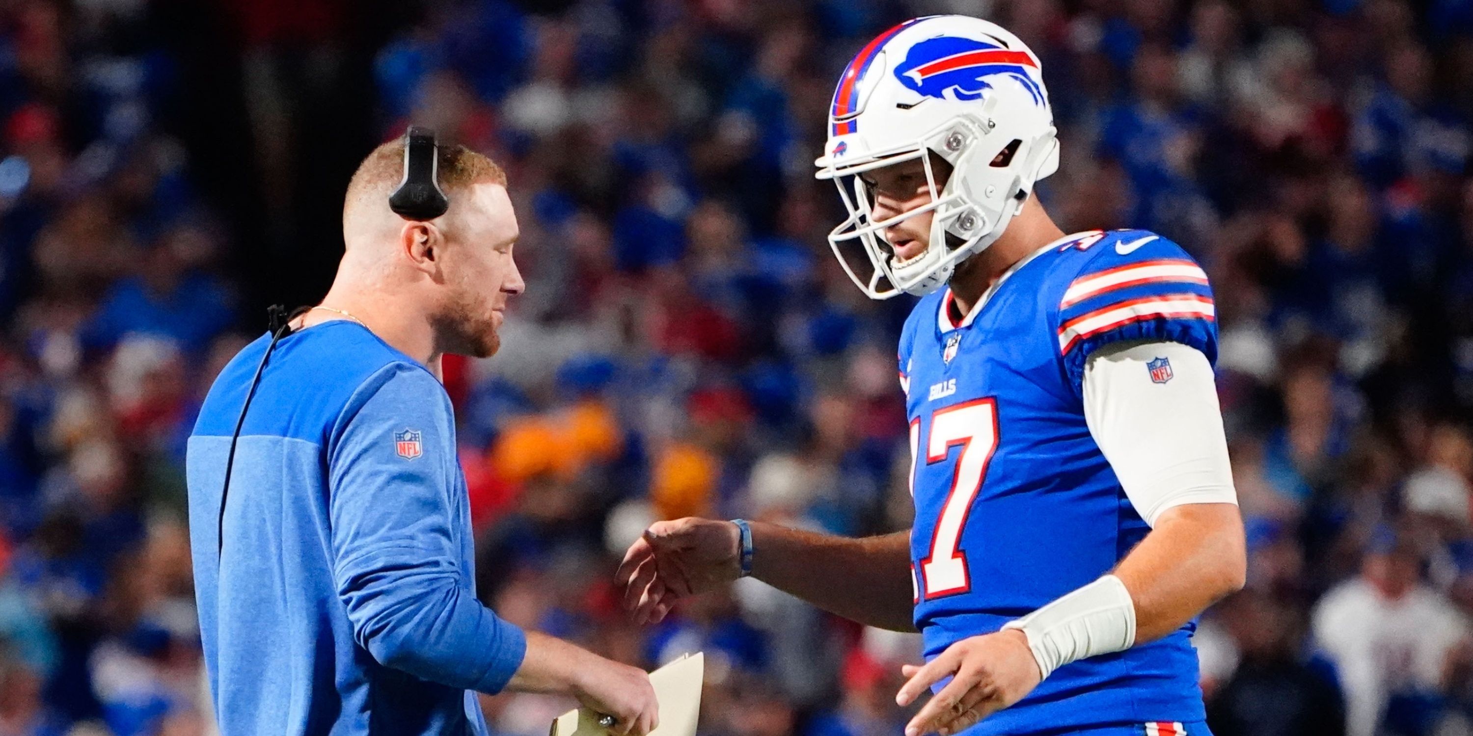 Joe Brady and Josh Allen chat on the sidelines 