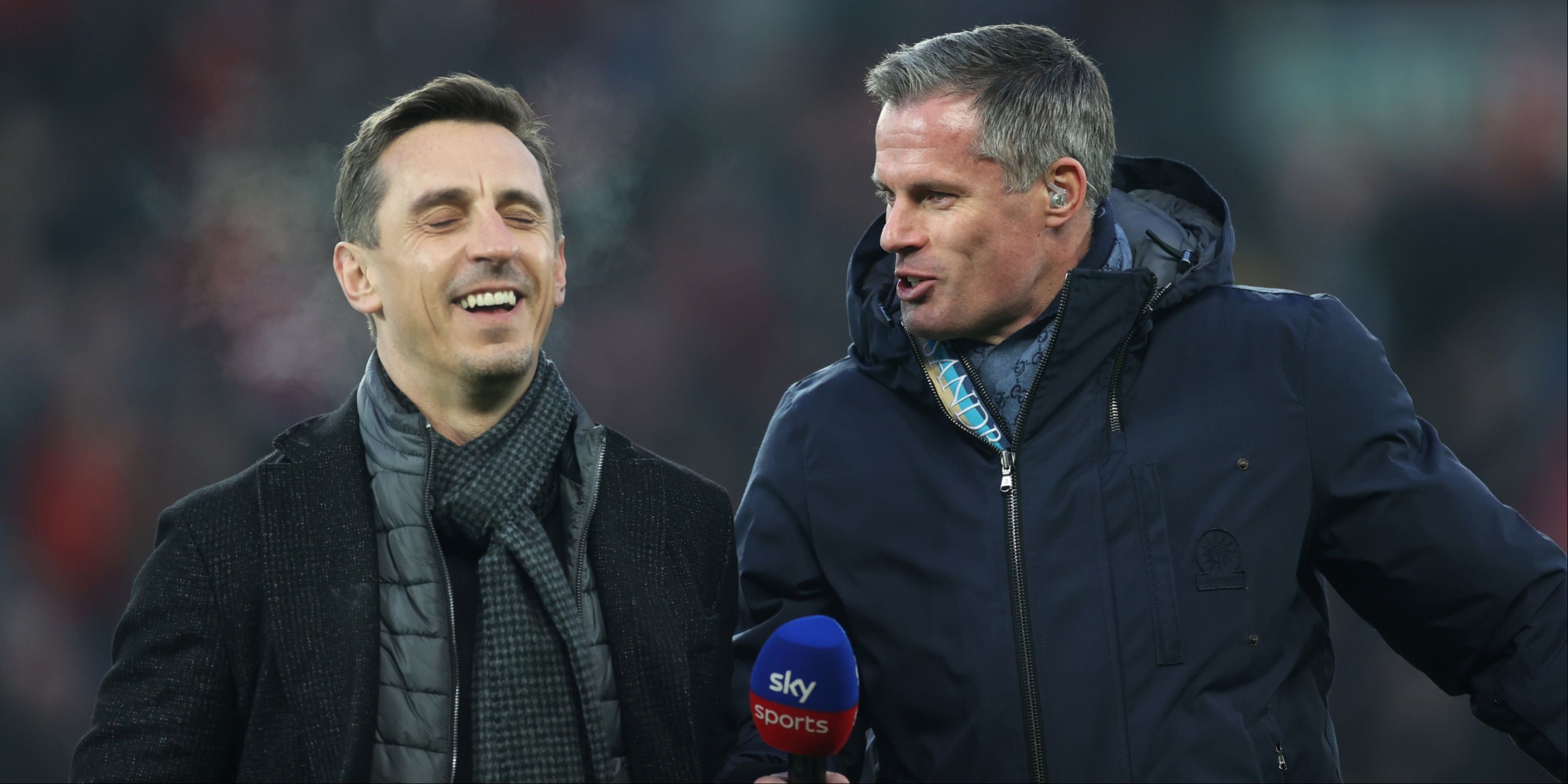 Sky Sports pundits Gary Neville and Jamie Carragher share a joke. 