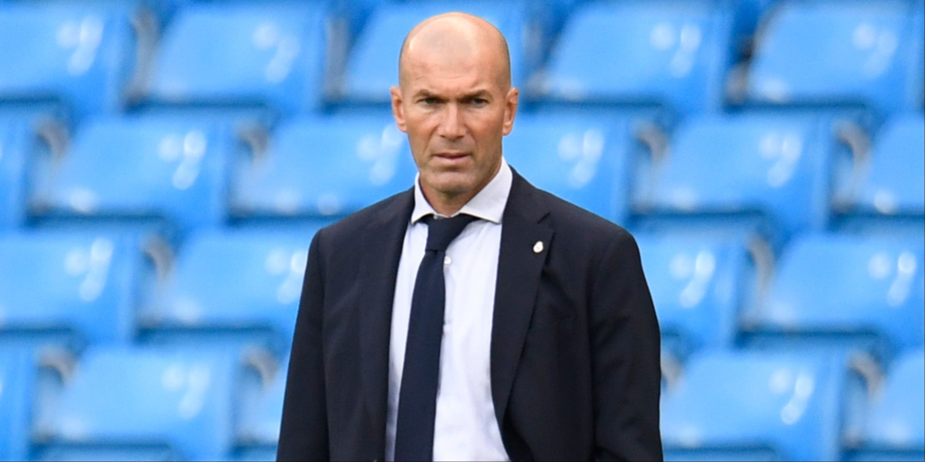 Zinedine Zidane watching on from the touchline during his Real Madrid reign