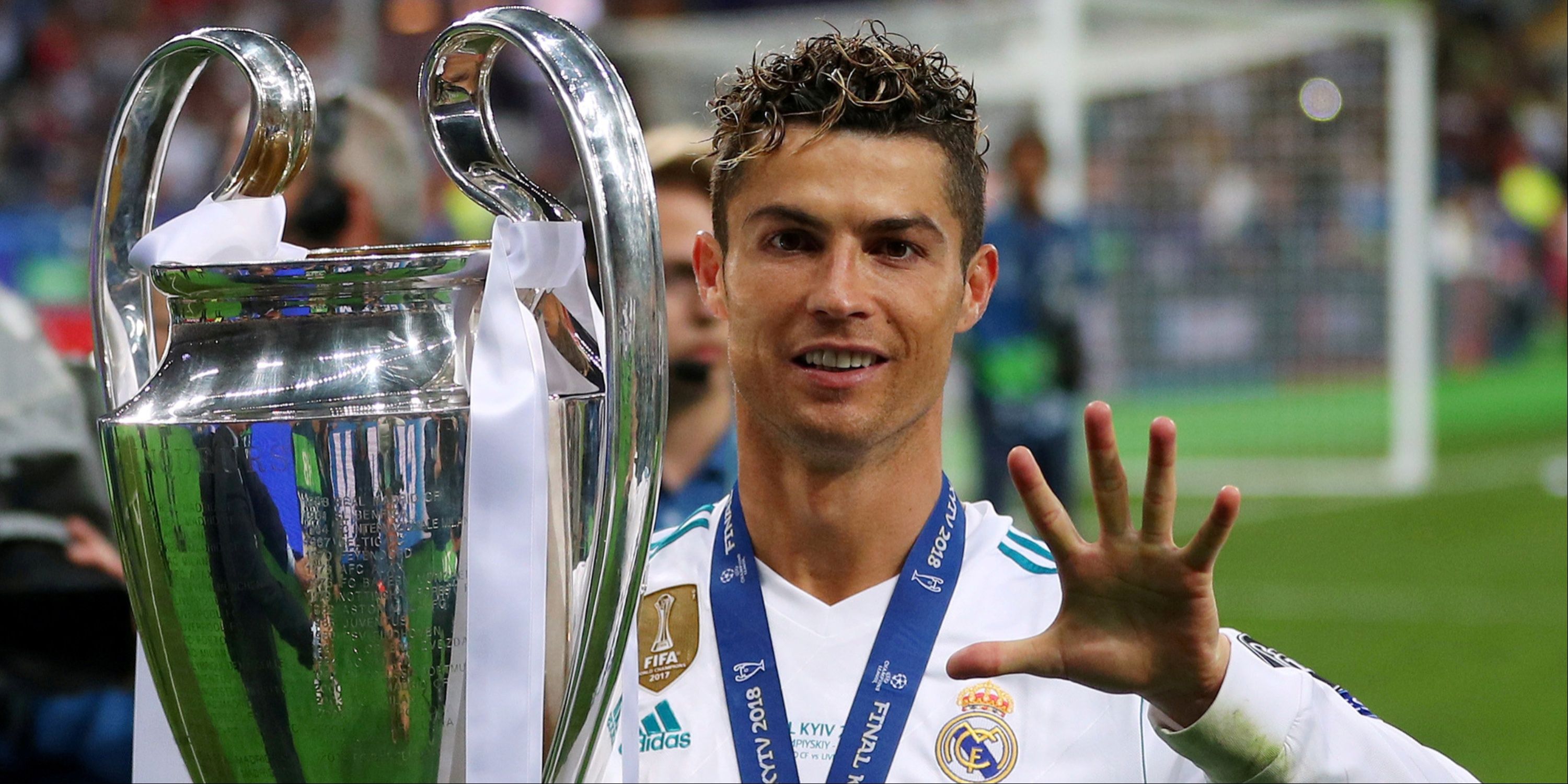 Cristiano Ronaldo with the Champions League trophy