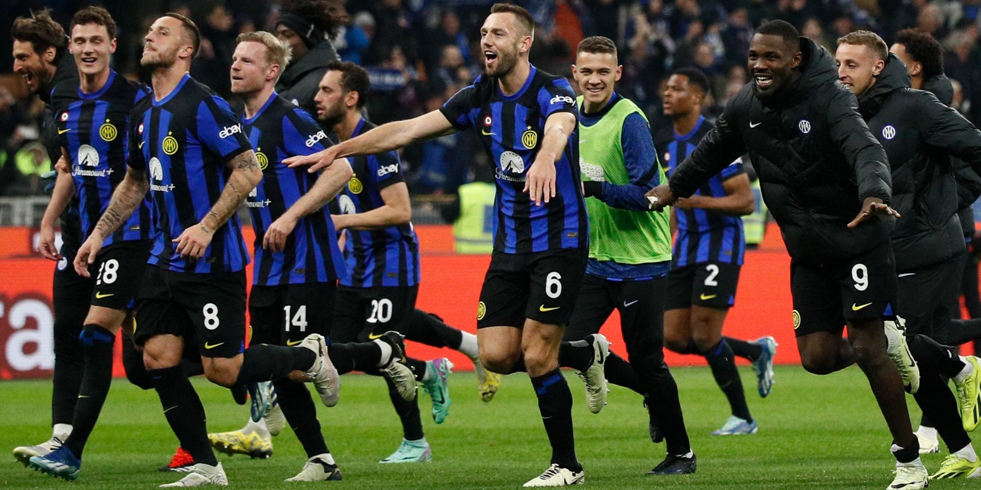 Inter Milan players celebrate after their match against Juventus.